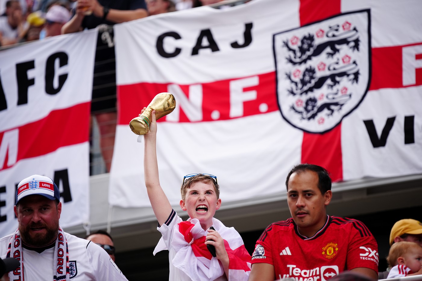 England fan with a inflatable world cup trophy during the international friendly