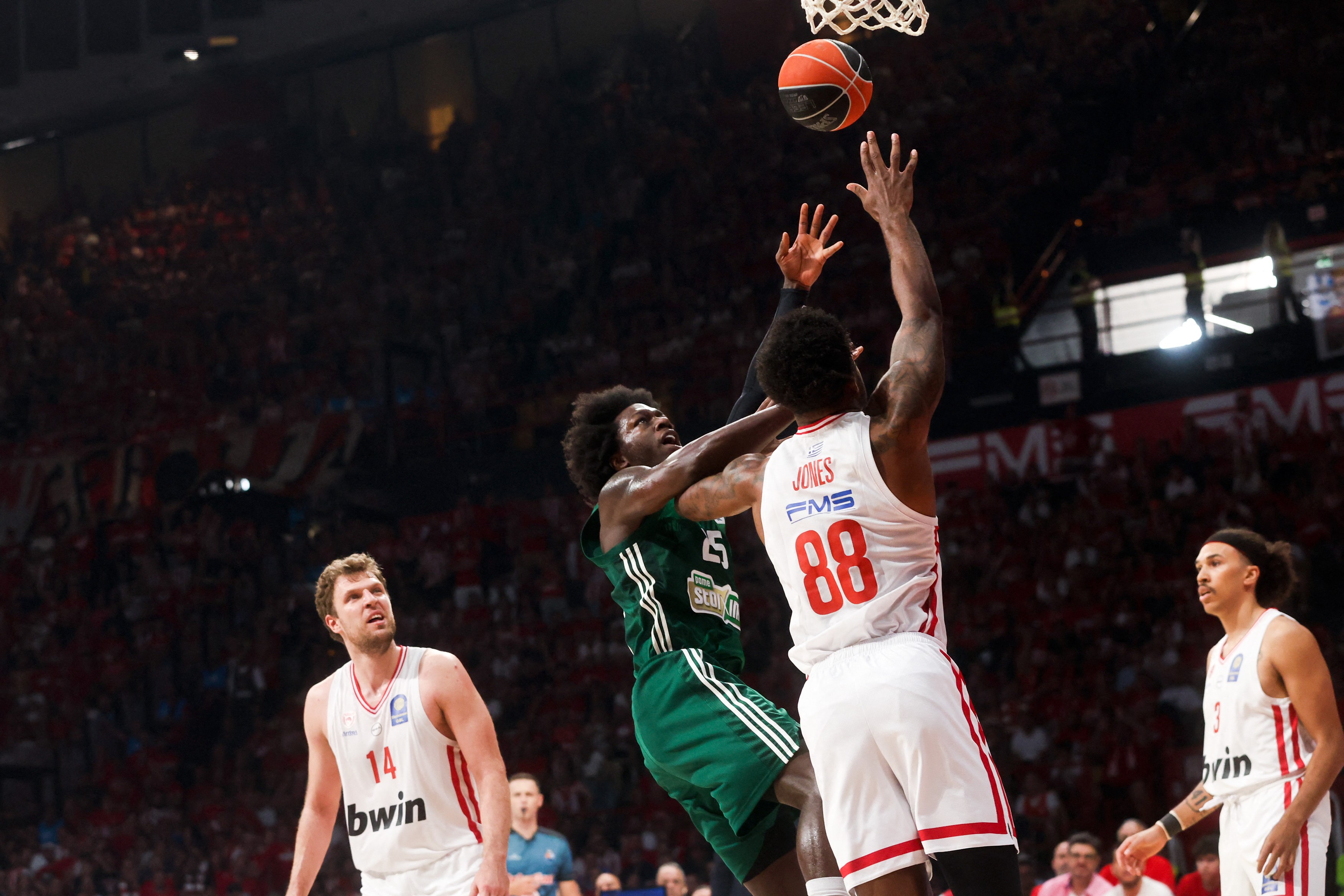 PIRAEUS, GREECE - JUNE 13: Kendrick Nunn (25) of Panathinaikos in action against Tyrique Jones (88) of Olympiacos