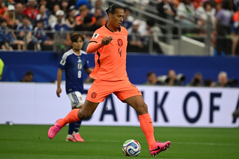epa13037160 Virgil van Dijk of Netherlands in action