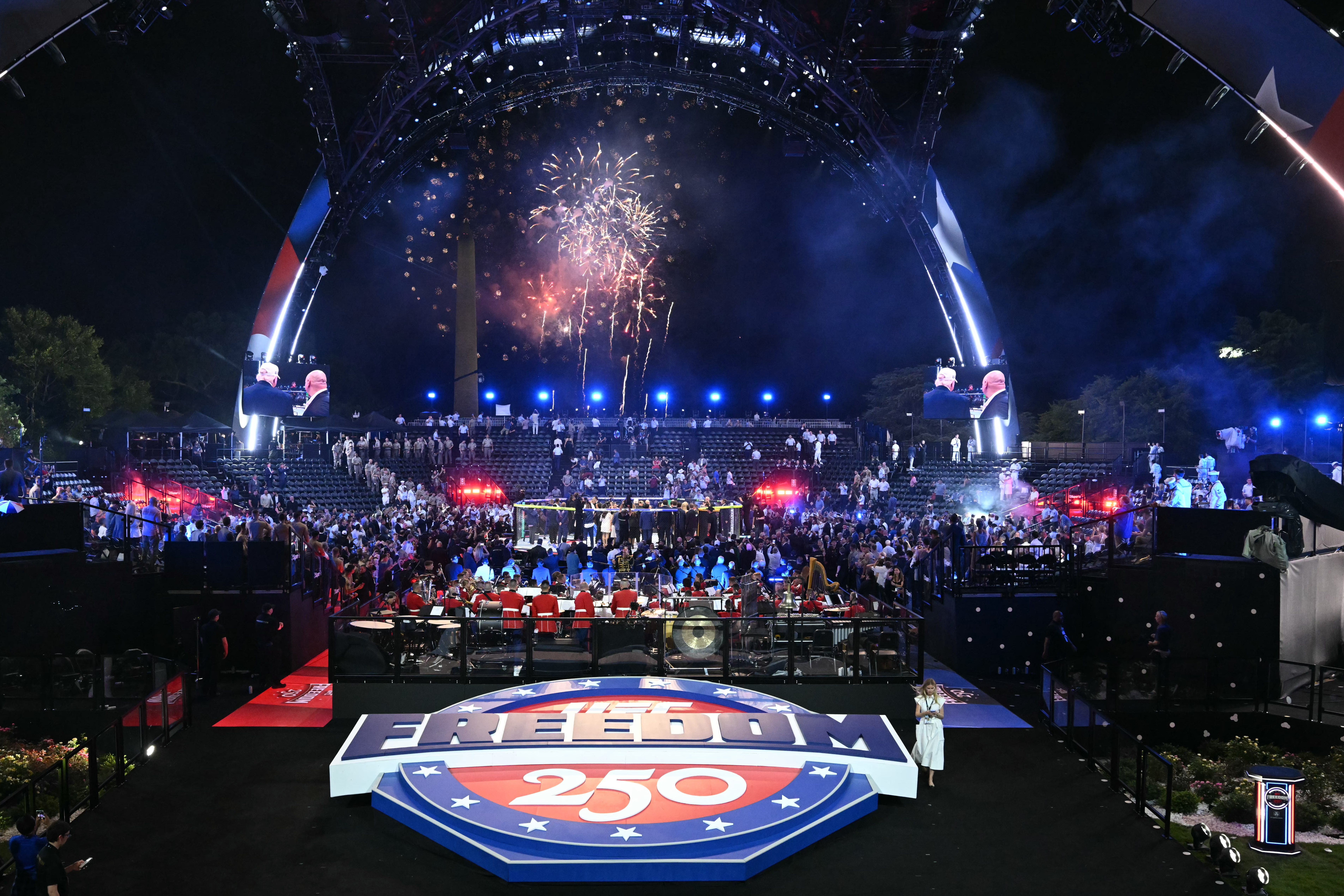 Fireworks illuminate the sky as Justin Gaethje of the USA celebrates after defeating