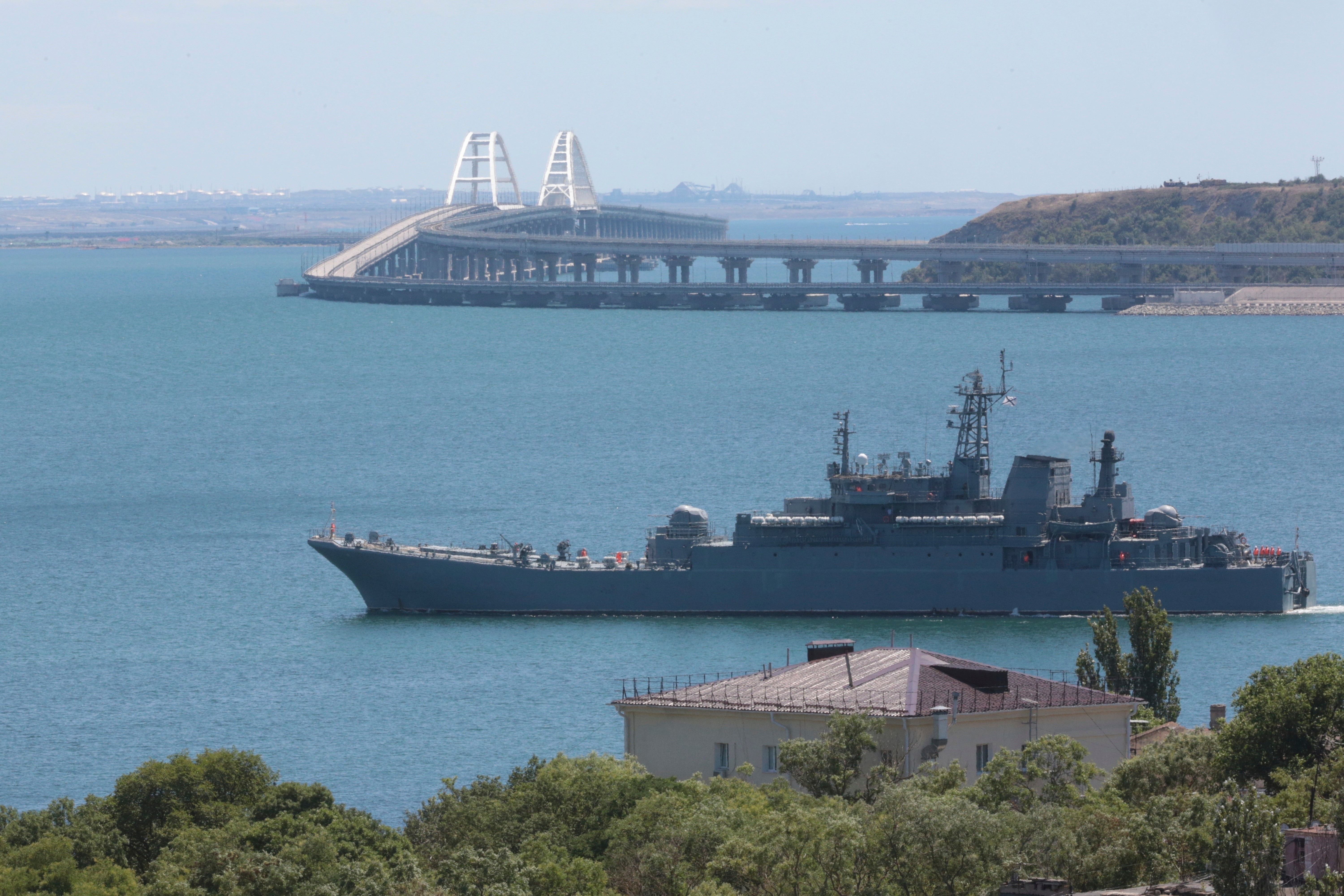 FILE - A Russian military ship transports cars and people from the Russian mainland to the Crimean Peninsula over the Kerch Strait on Monday, July 17, 2023. (AP Photo, File)
