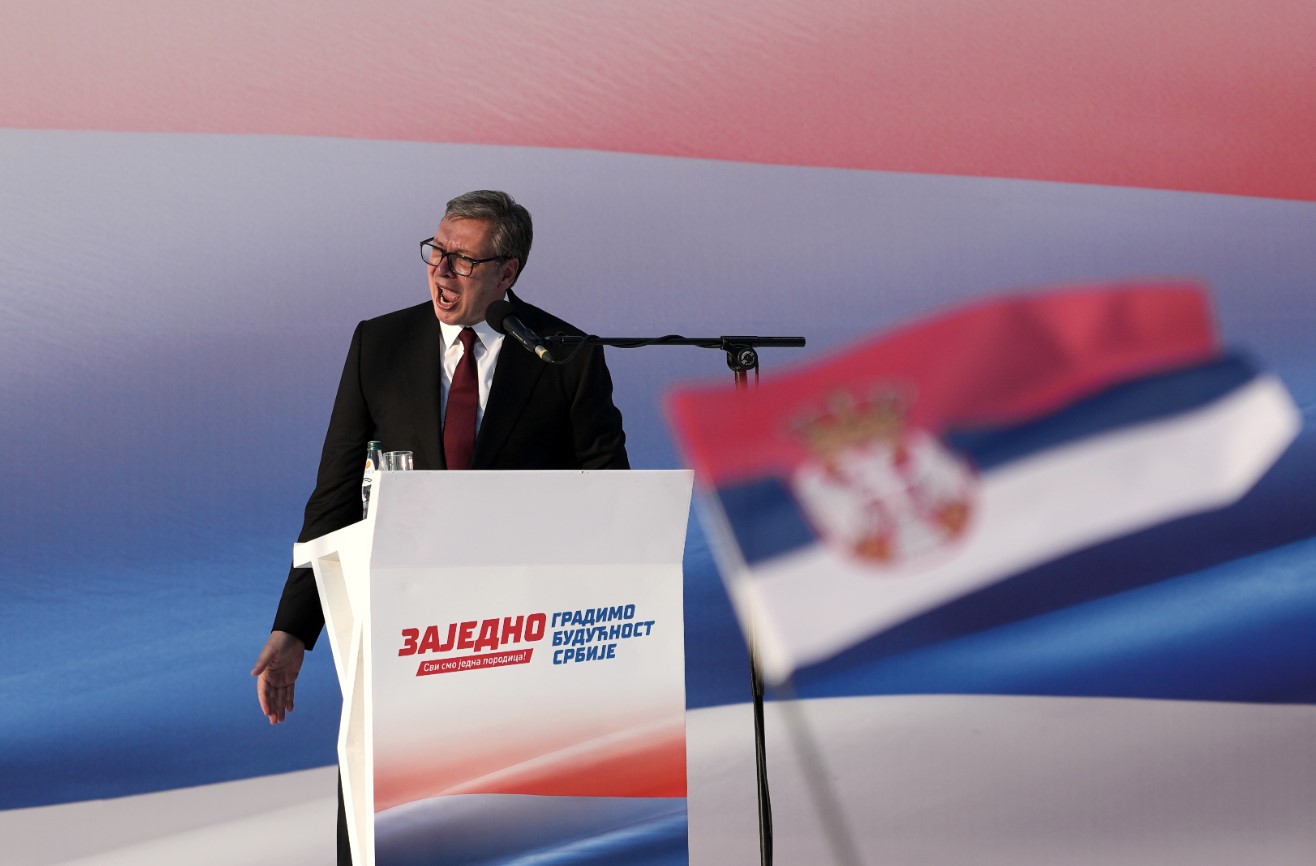 Serbian President Aleksandar Vucic addresses a rally of the ruling Serbian Progressive Party (SNS) in Belgrade, Serbia, Saturday, June 27, 2026, where he announced that he will resign in the coming weeks. (AP Photo/Darko Vojinovic)