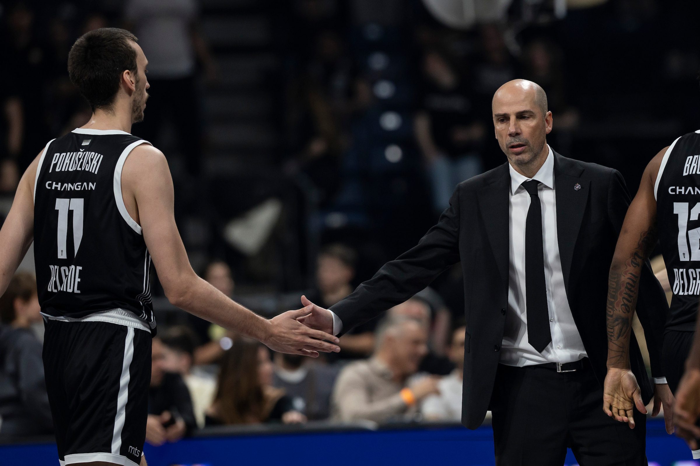 Joan Pennaroya, Head Coach of Partizan Mozzart Bet Belgrade shake hands with Aleksej Pokusevski