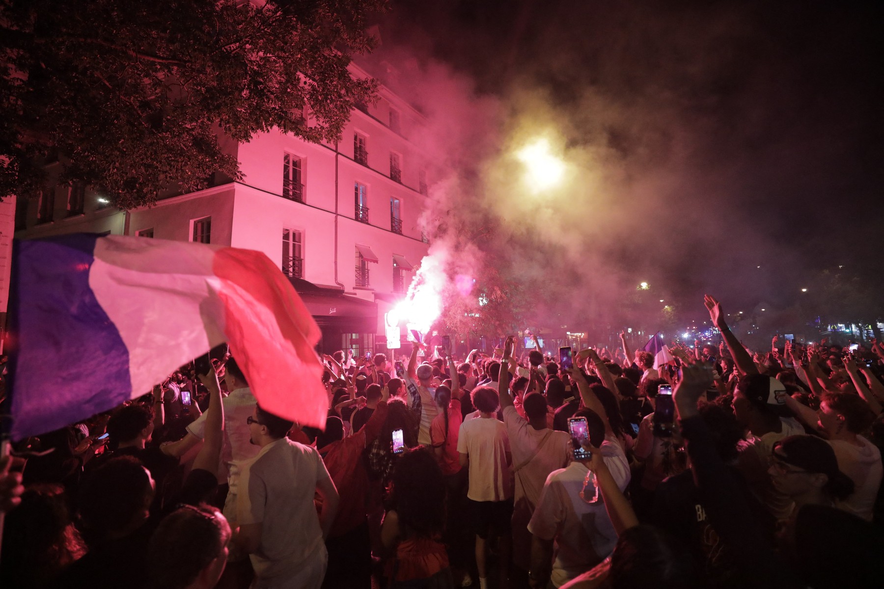 PARIS, FRANCE - JULY 10: French football fans celebrate after their nation