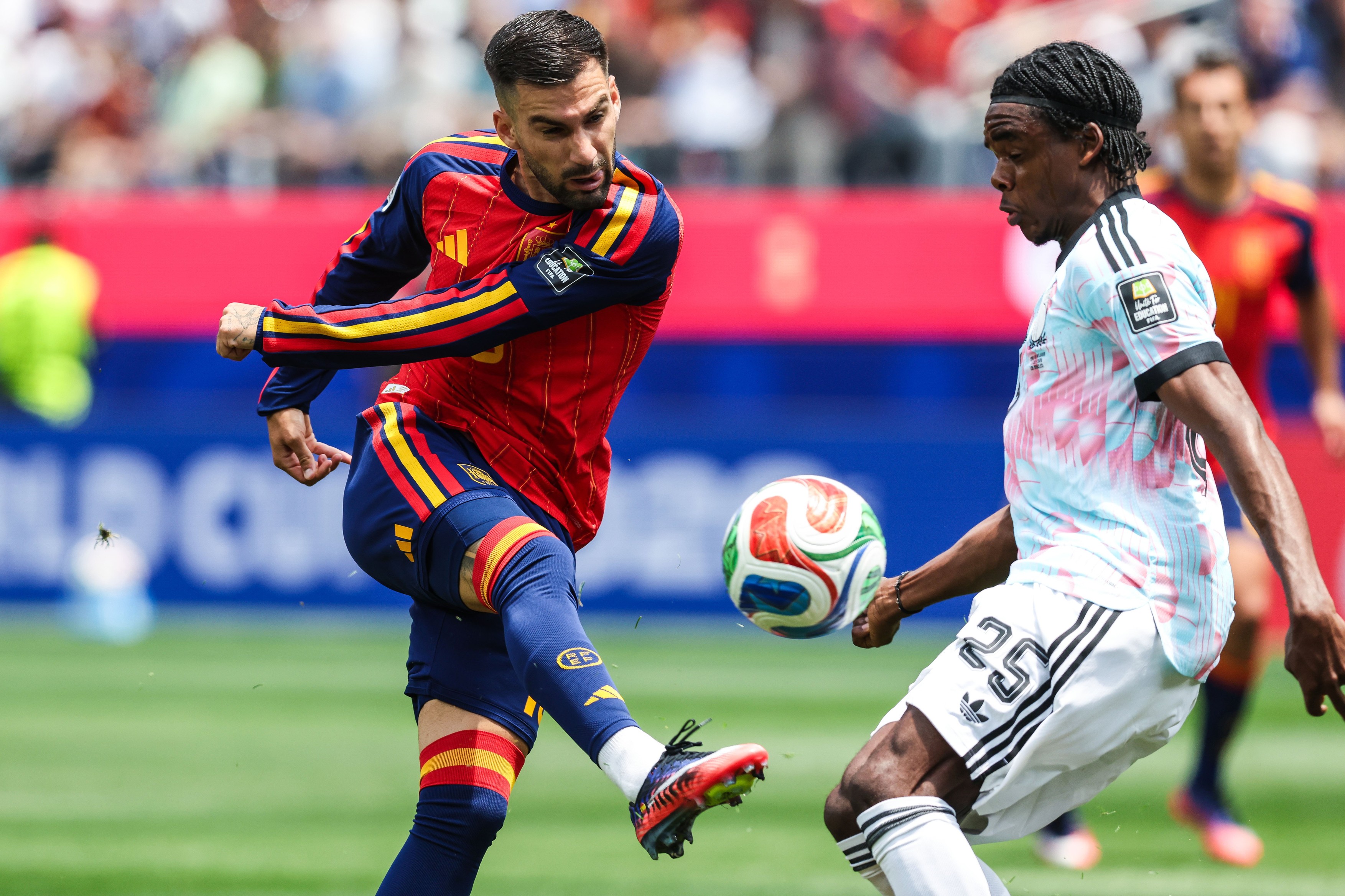 Spain's Alex Baena and Belgium's Nathan Ngoy pictured in action