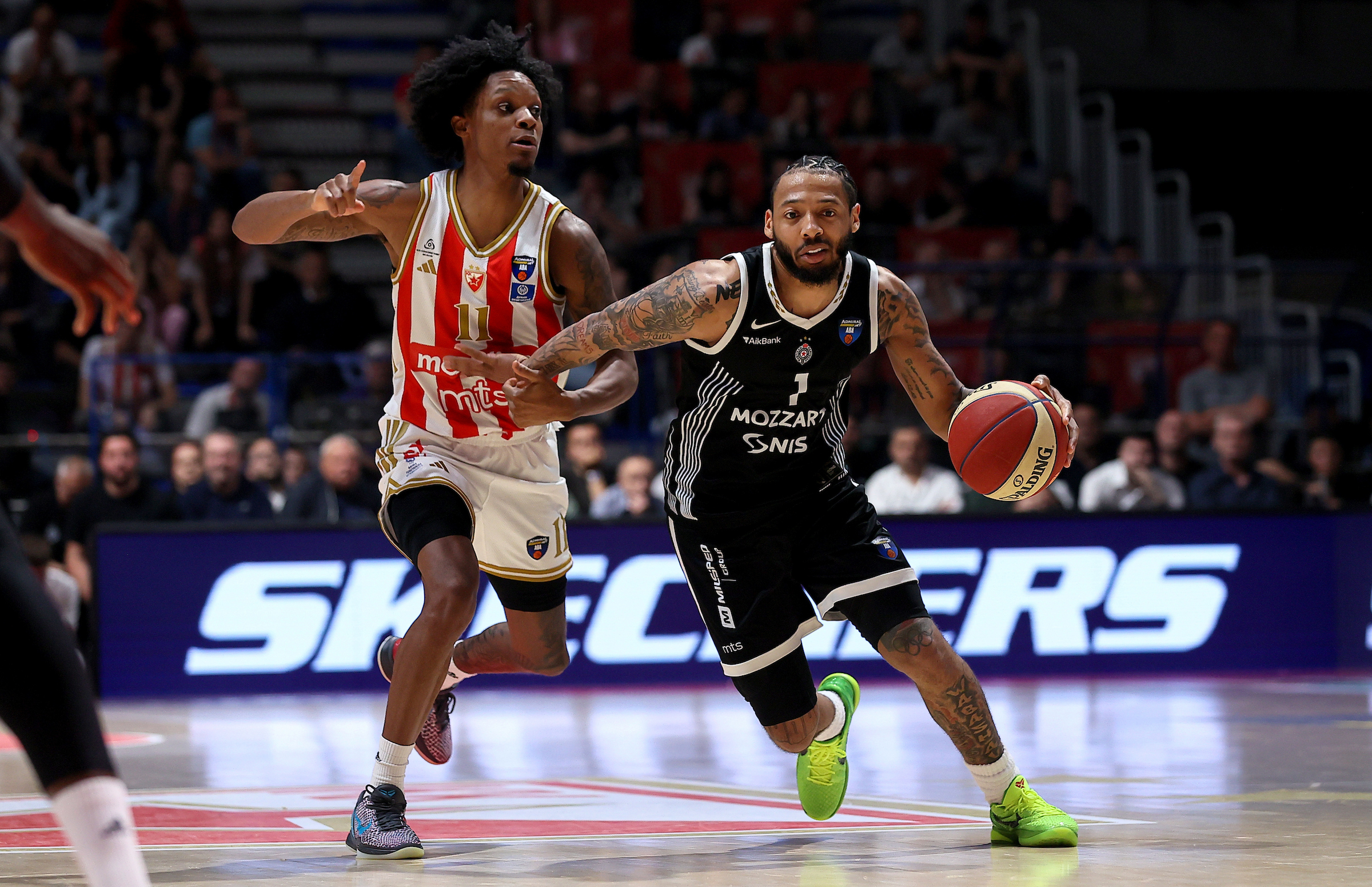 Tyson Gregory Carter of Crvena Zvezda (L) in action against Carlik Jones of Partizan (R)