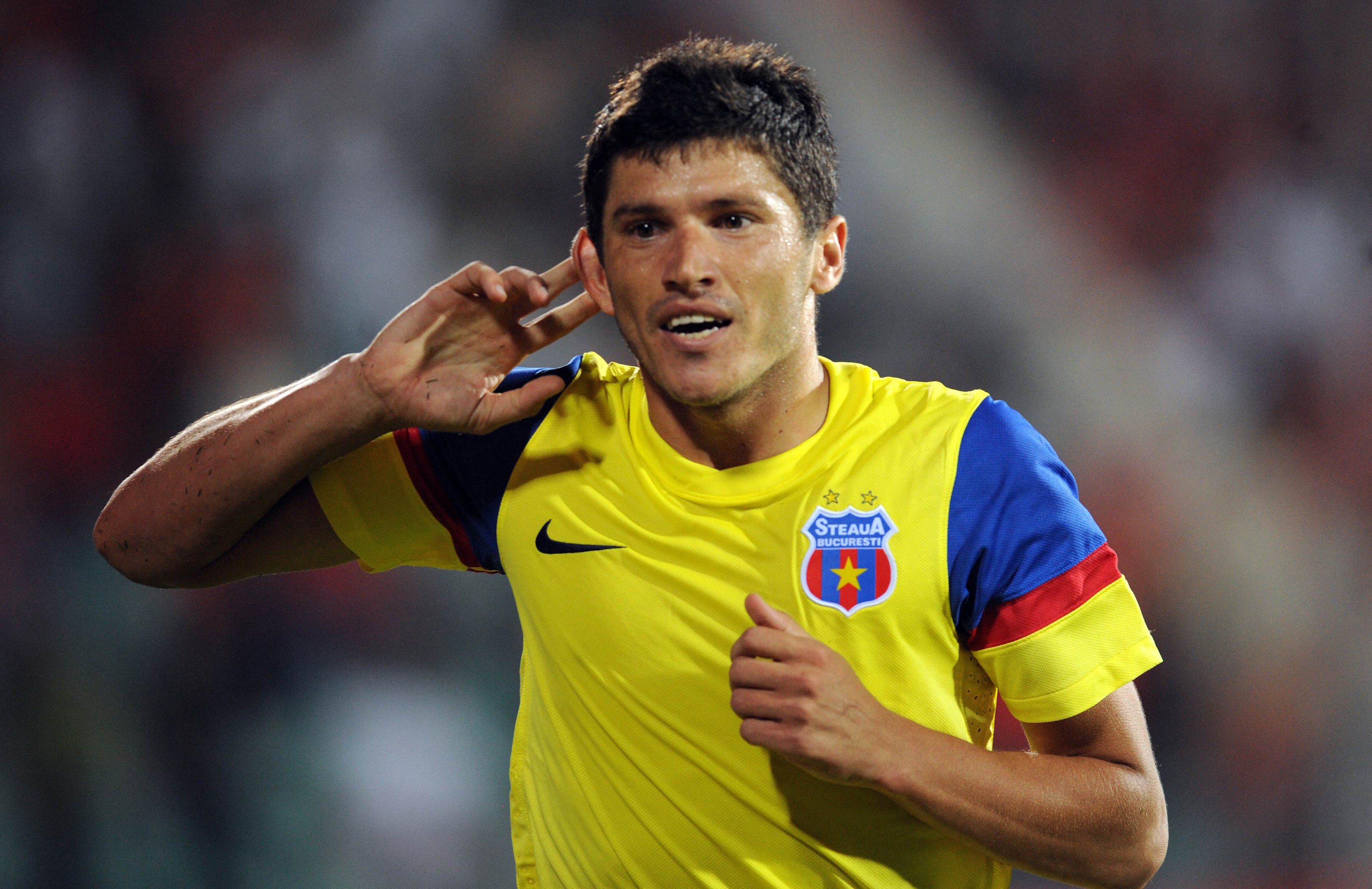 Steaua's Cristian Tanase celebrates after scoring against CSKA Sofia