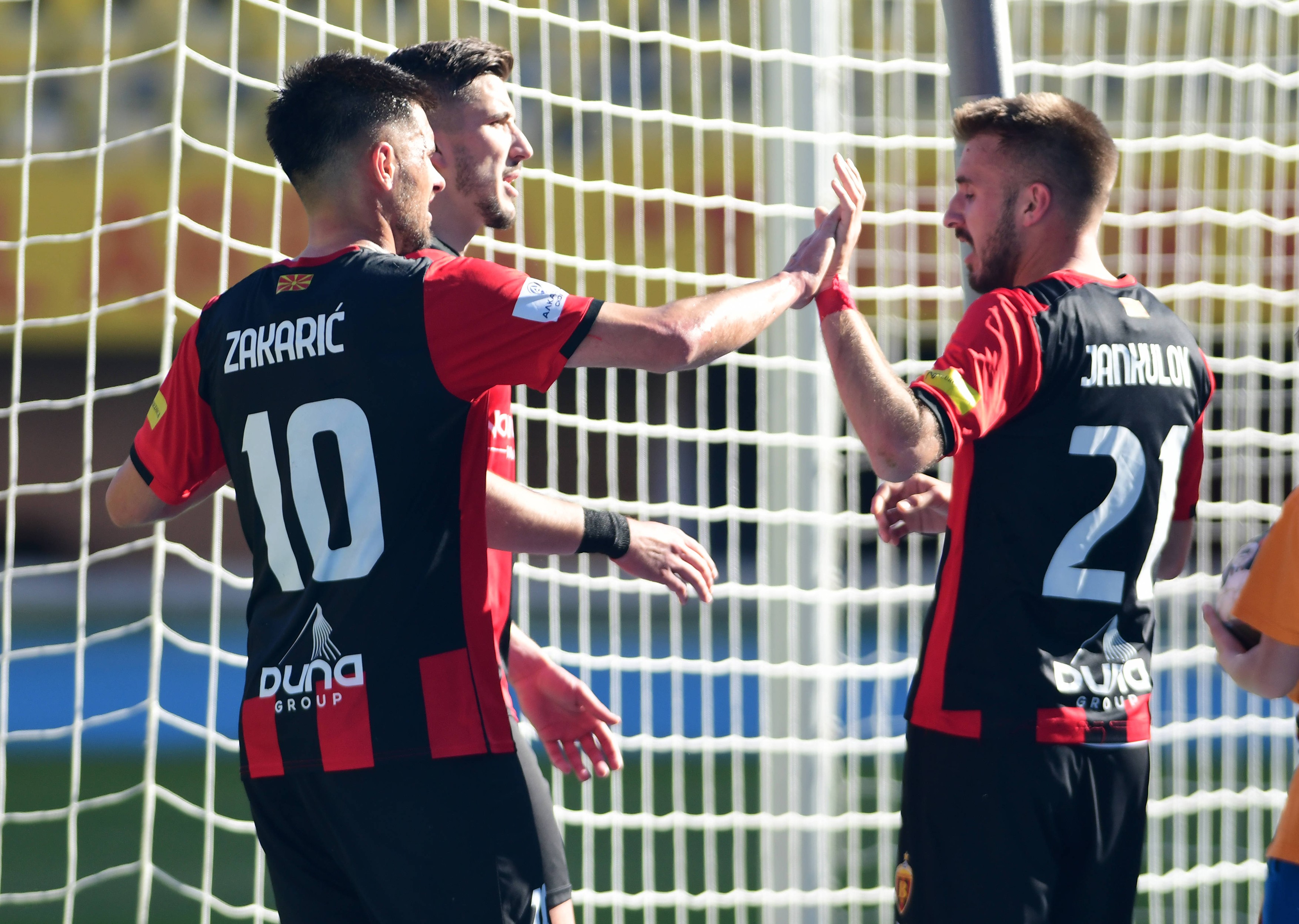 Players of FC Vardar celebrate during first Macedonian football league