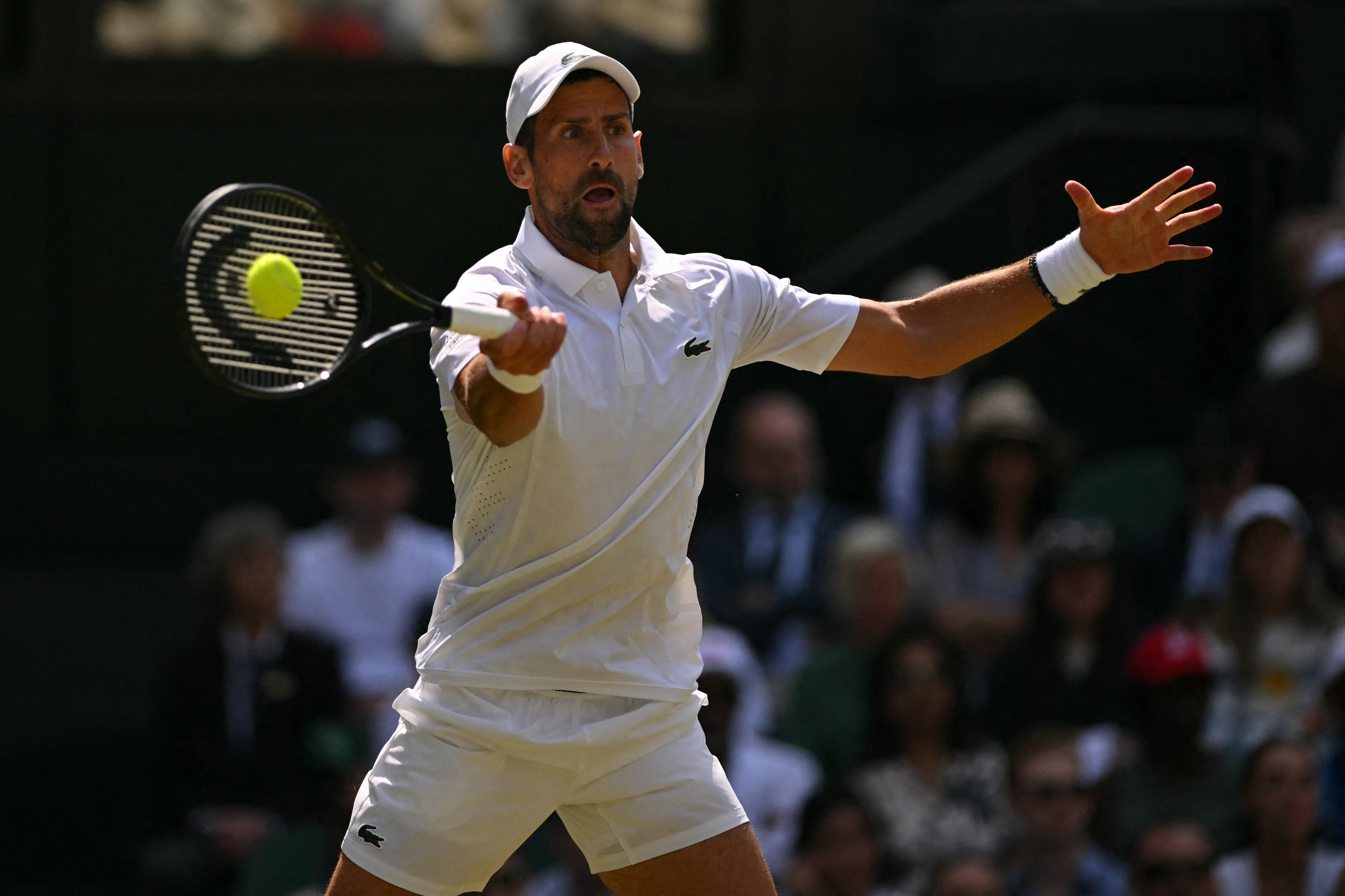 Serbia's Novak Djokovic returns to France's Arthur Rinderknech