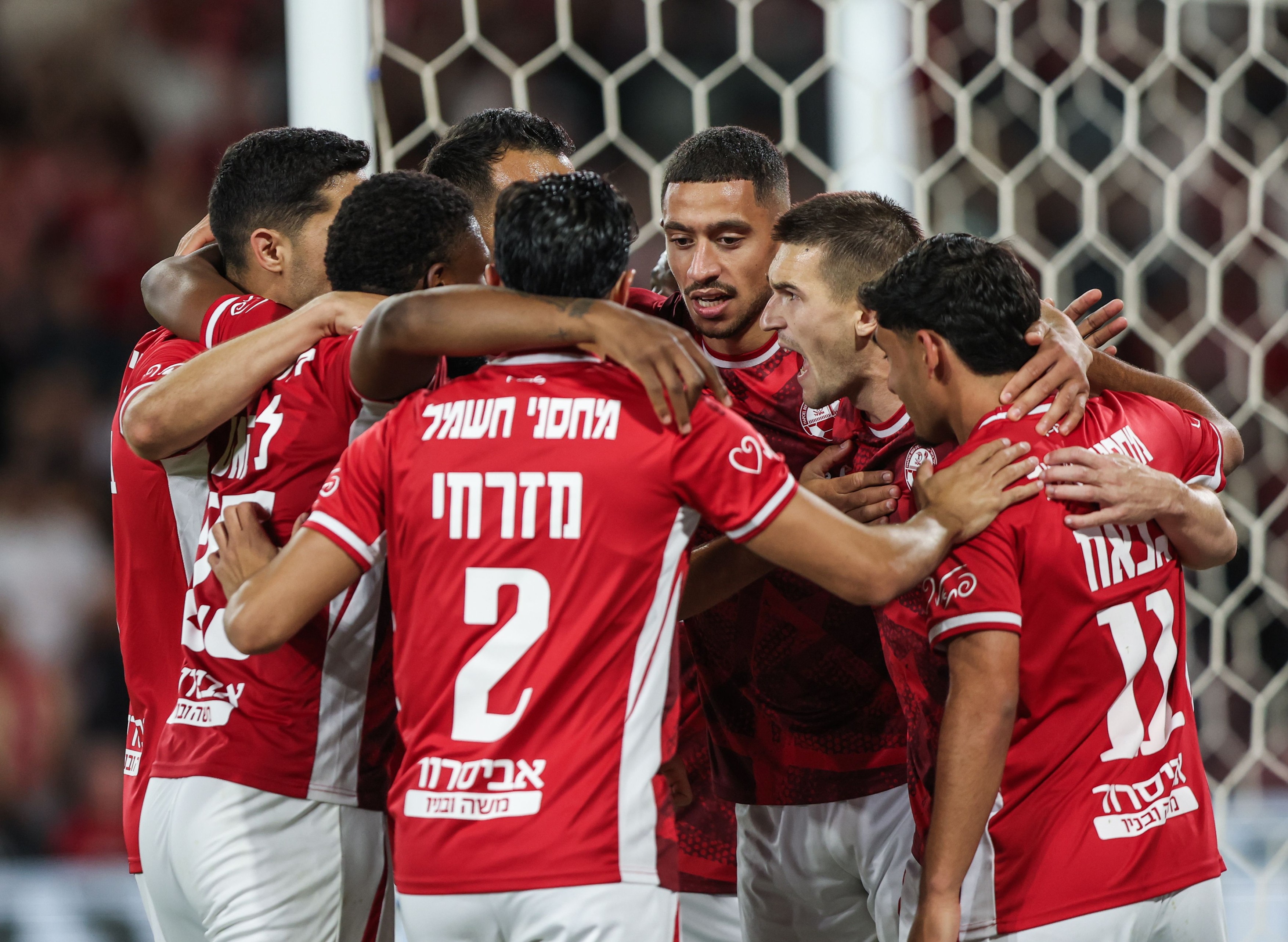 Hapoel Beer Sheva players celebrate together with IGOR ZLATANOVIC (77)