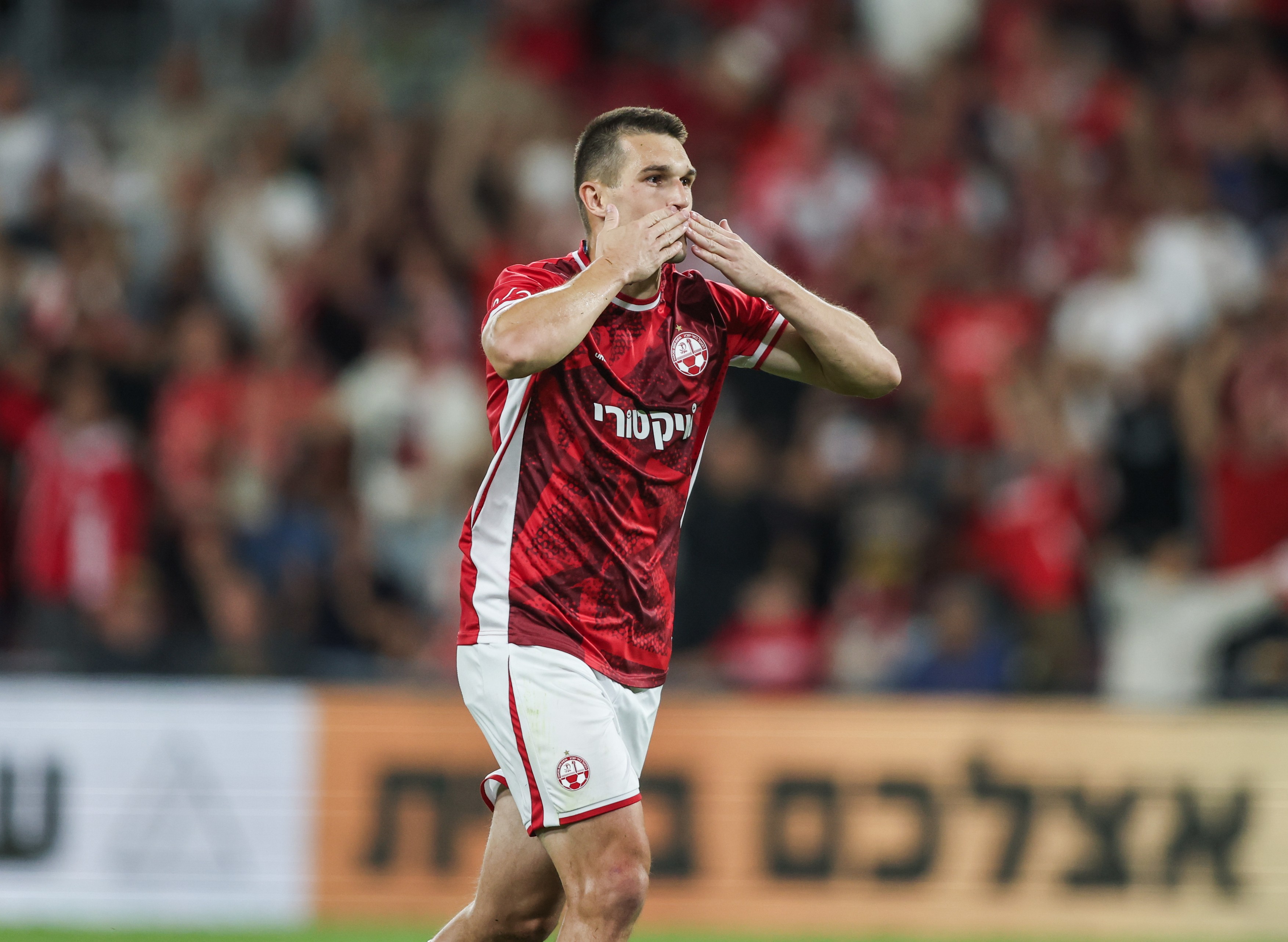 Hapoel Beer Sheva player IGOR ZLATANOVIC (77) celebrates scoring the goal