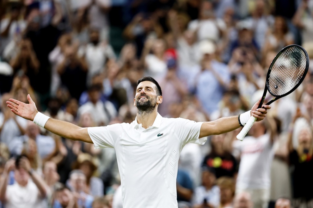 epa13096639 Novak Djokovic of Serbia celebrates after winning his Men's Singles quarter final match against Felix Auger Aliassime of Canada at the Wimbledon Championships in London, Britain, 07 July 2026.  EPA/TOLGA AKMEN
