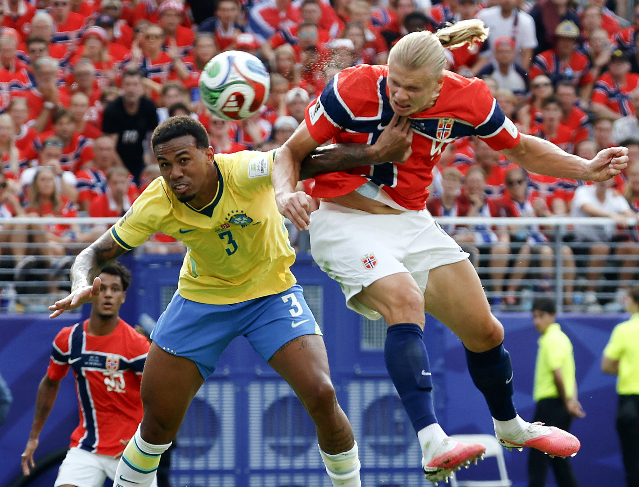 Norway's Erling Haaland (R) scores his team's first goal in a World Cup round of 16