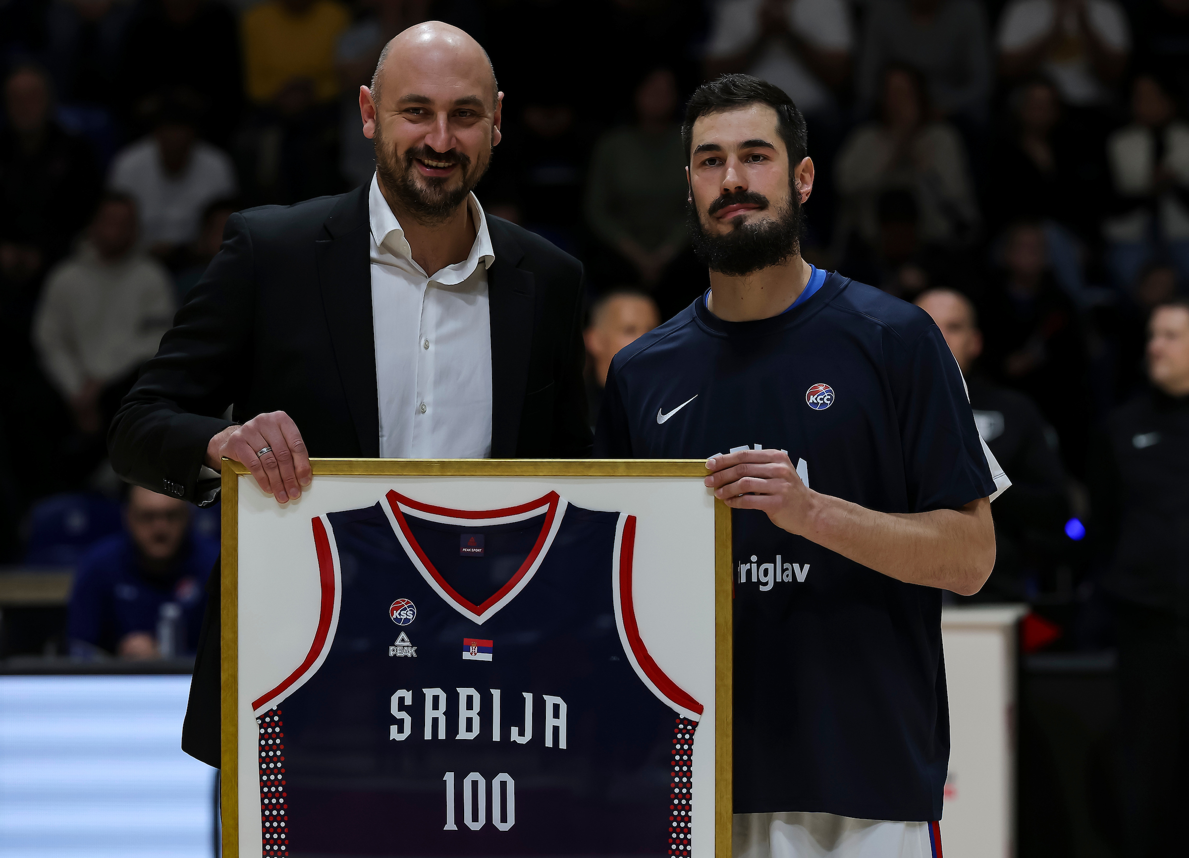 Nikola Kalinic (R) of Serbia receive present for the 100 games for the national team of Serbia from Nikola Krstic