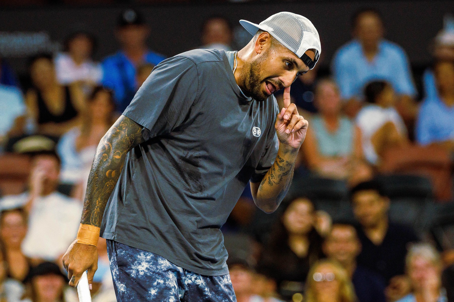 Nick Kyrgios gestures as he and Thanasi Kokkinakis of Australia play in th