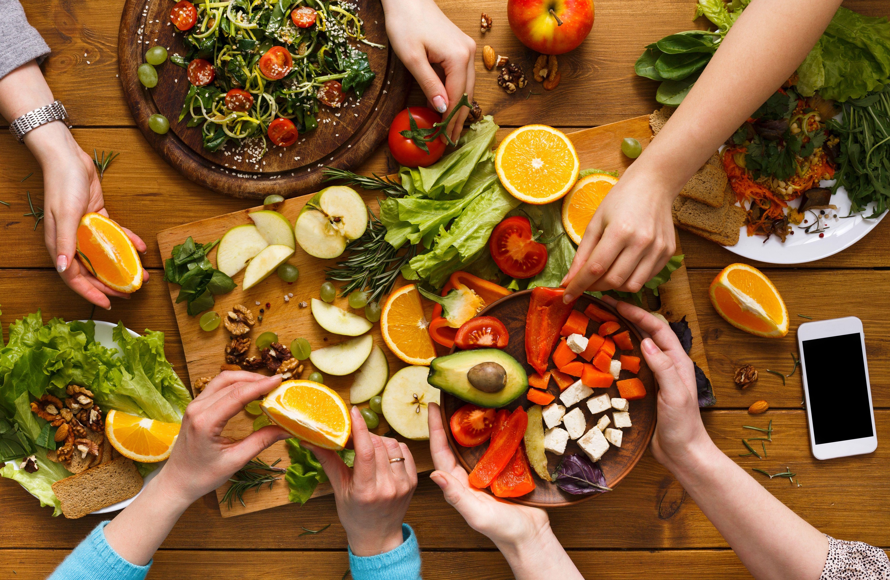 Family dinner table. Women at home together, eat heakthy food, top view, flat lay