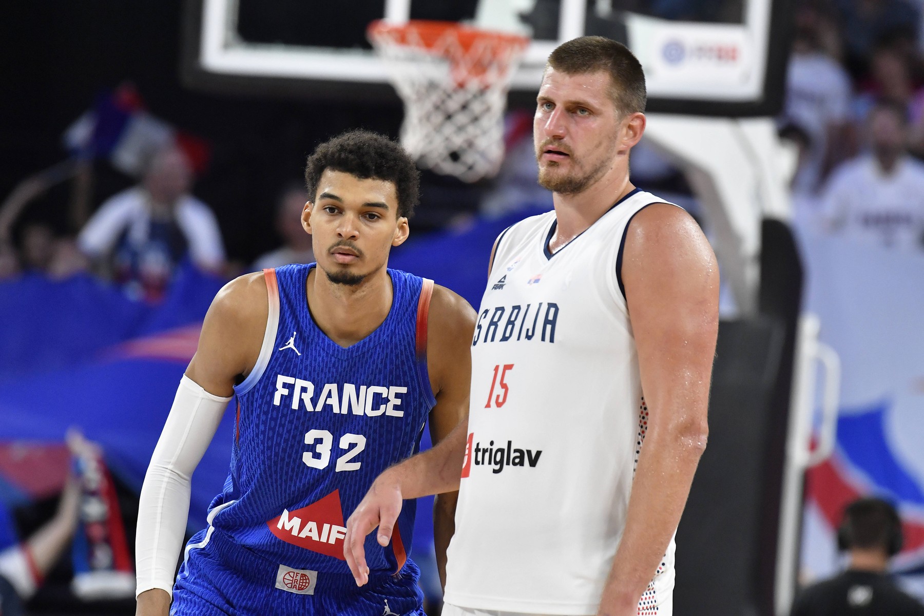 France's center Victor Wembanyama and Serbia's center Nikola Jokic   during t