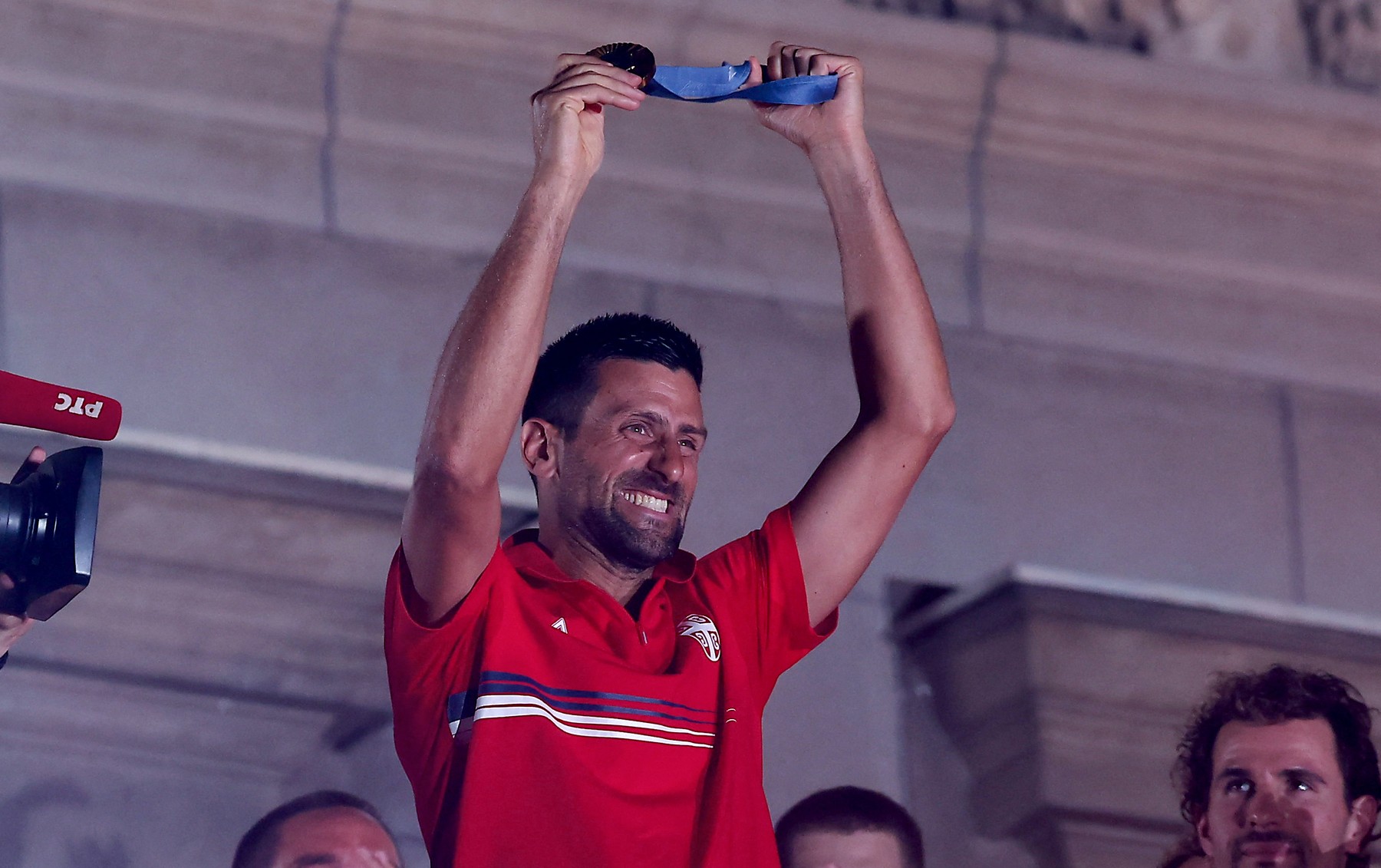 Tennis gold medallist Novak Djokovic celebrates during a welco