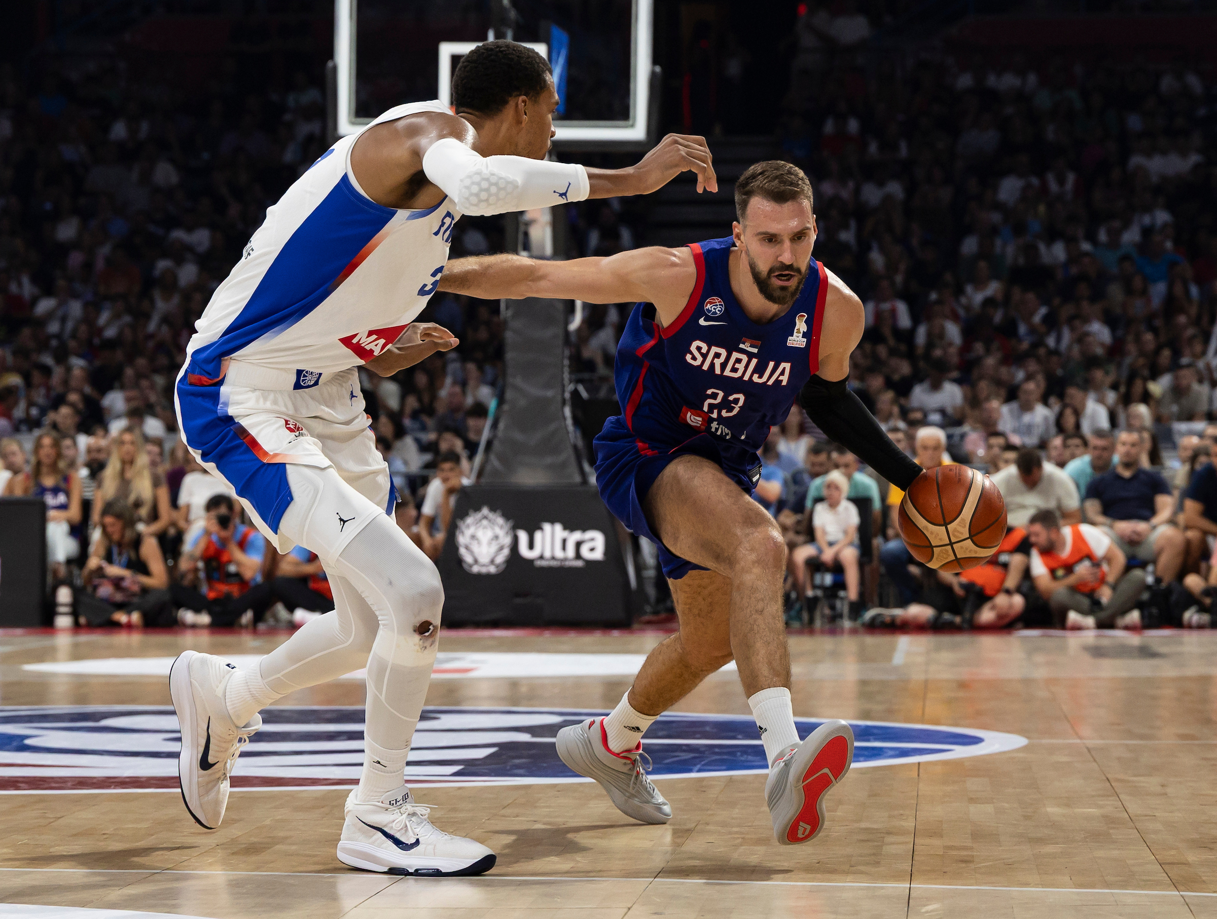 BELGRADE, SERBIA - AUGUST 20: Marko Guduric (R) of Serbia in action against Victor
