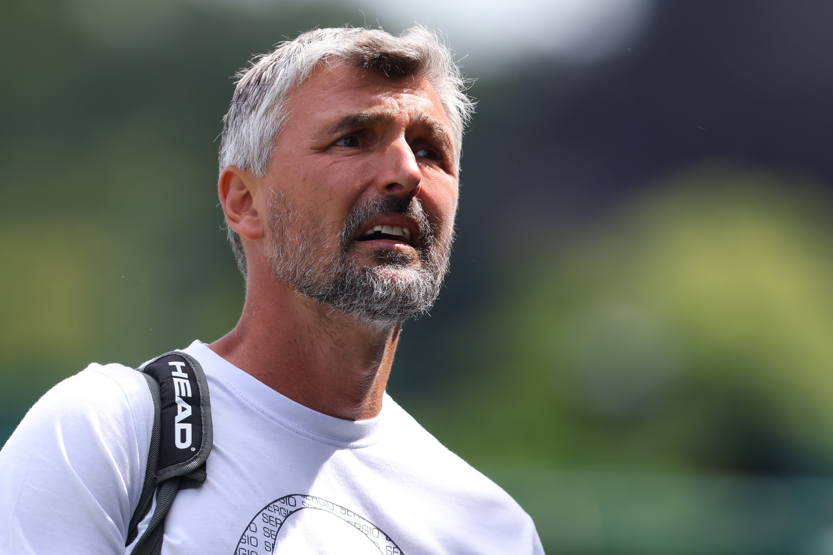 25th June 2022, All England Lawn Tennis and Croquet Club, London, England;  Wimbledon Tennis tournament; Novak Djokovic's coach Goran Ivanisevic leaves the court after the session