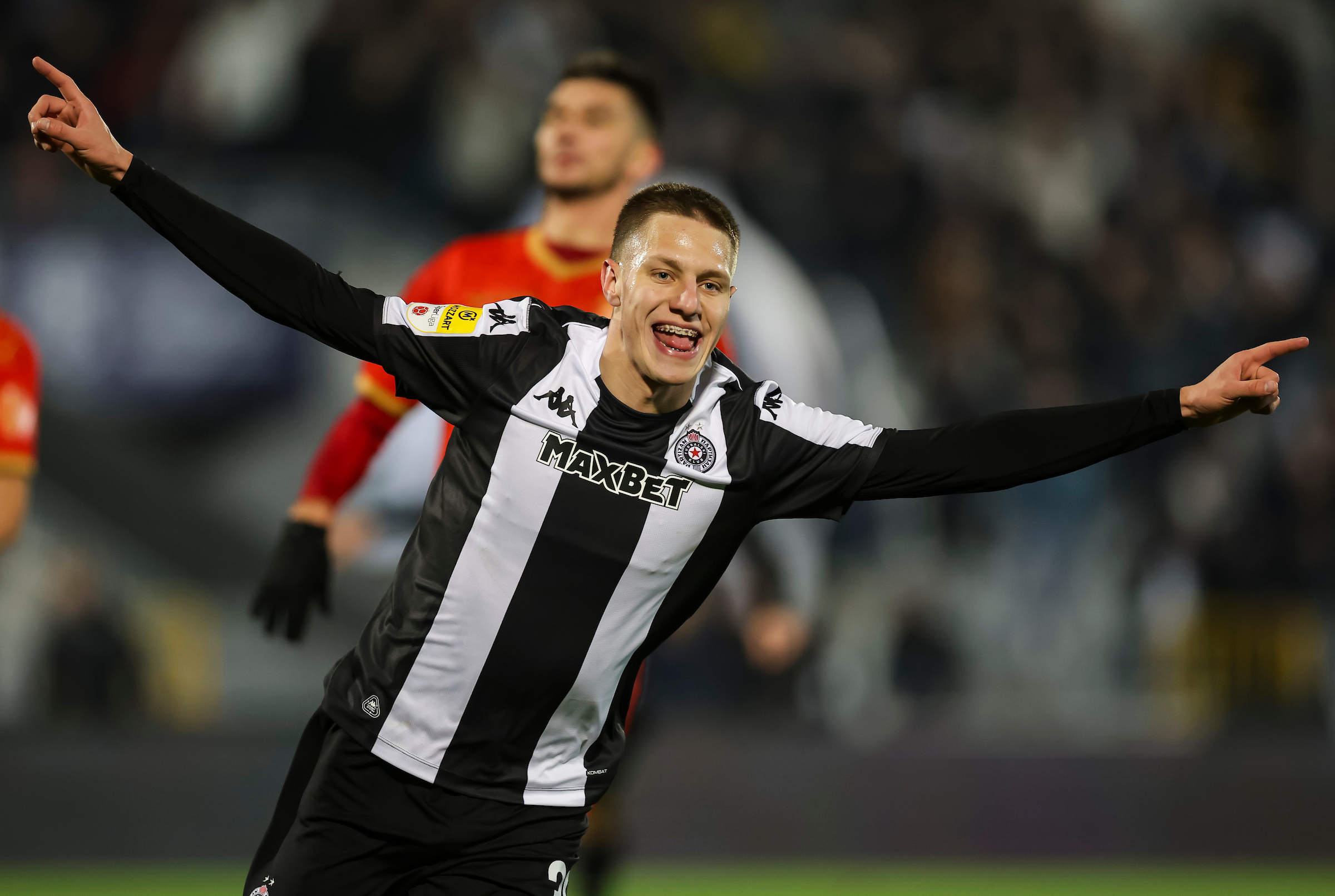 Ognjen Ugresic of Partizan celebrates after scoring a goal