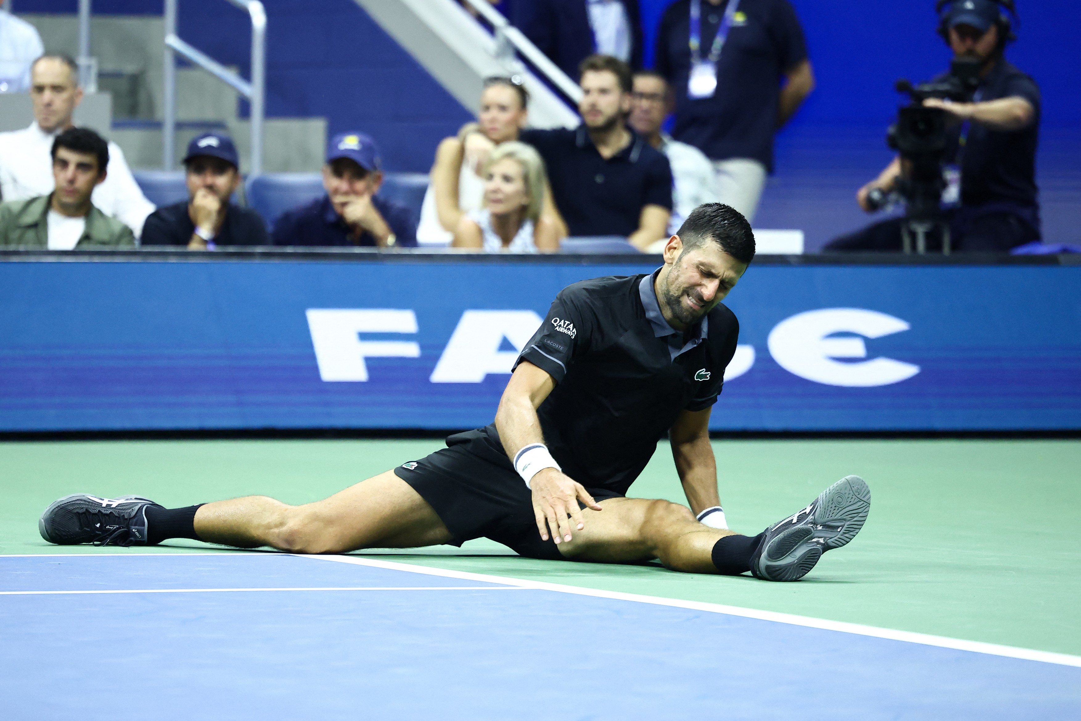 Serbia's Novak Djokovic reacts against Argentina's Mariano Navone