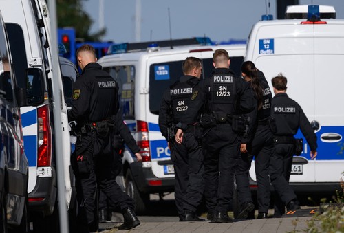 Police officers are preparing for an operation at Leipzig/Halle Airport