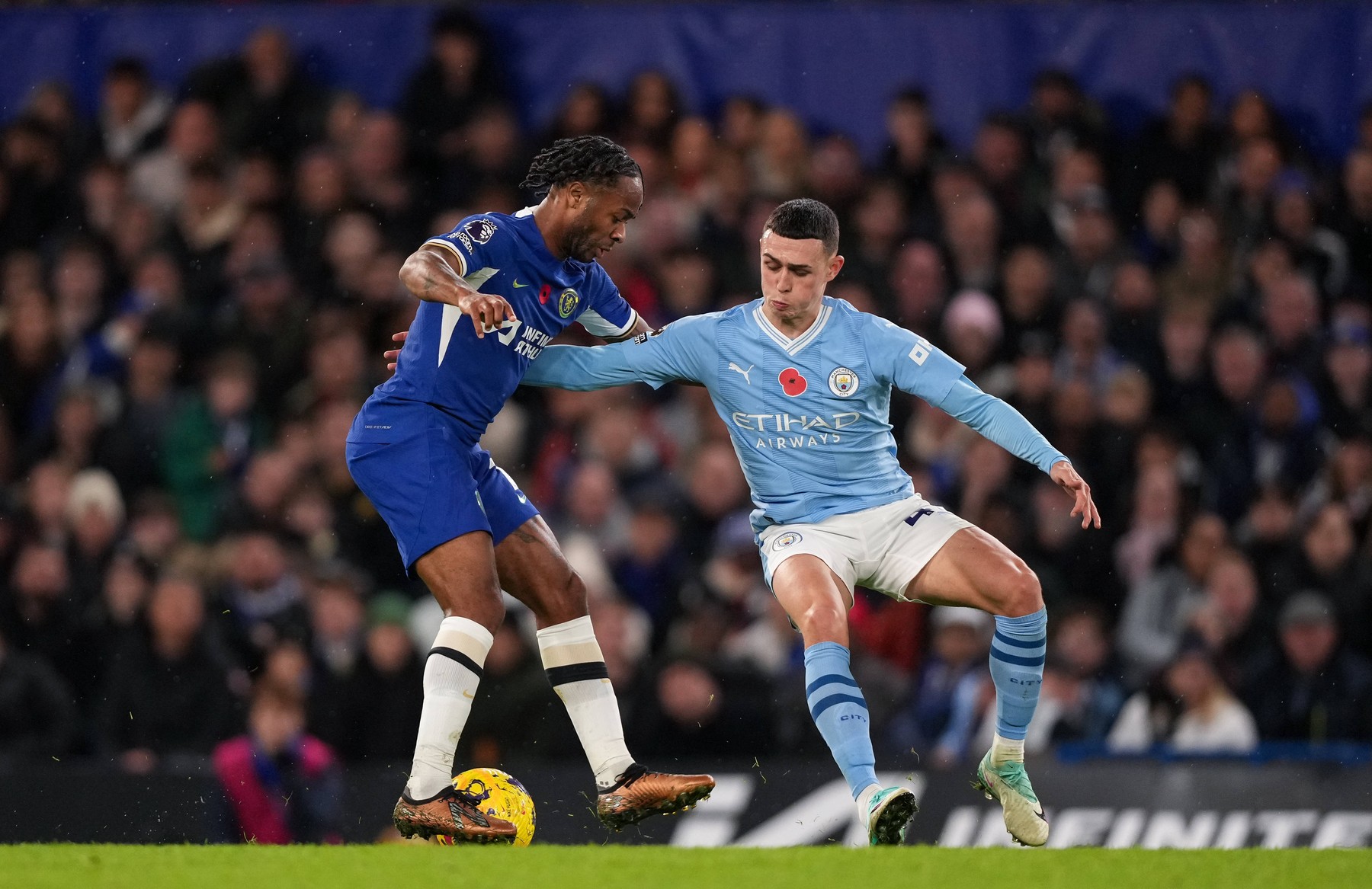 Raheem Sterling of Chelsea and Phil Foden of Man City during the Premier Lea