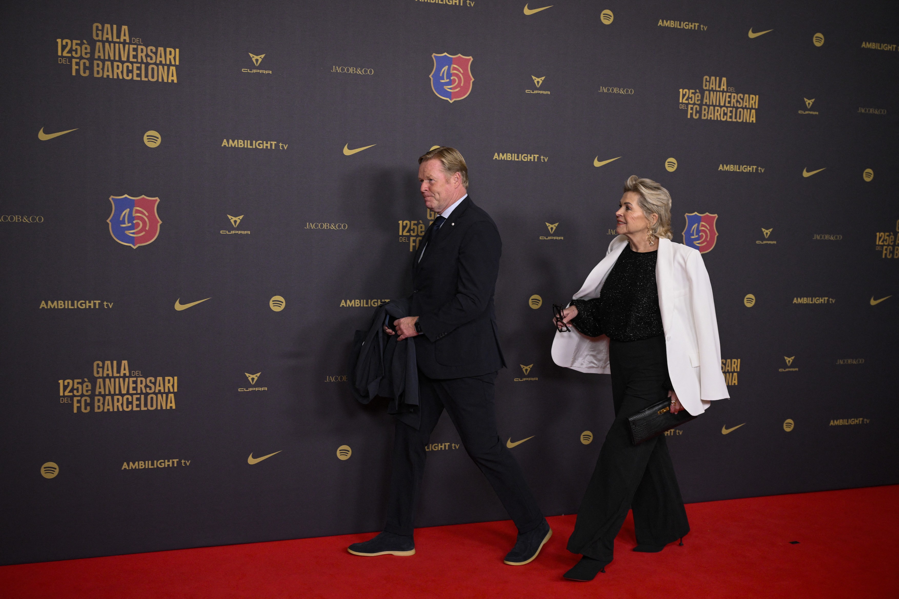 Former Barcelona player and coach Ronald Koeman (L) and his wife Bartina poses in a photocall gala in celebration of the 125th anniversary of the founding of FC Barcelona, in the Gran Teatre del Liceu