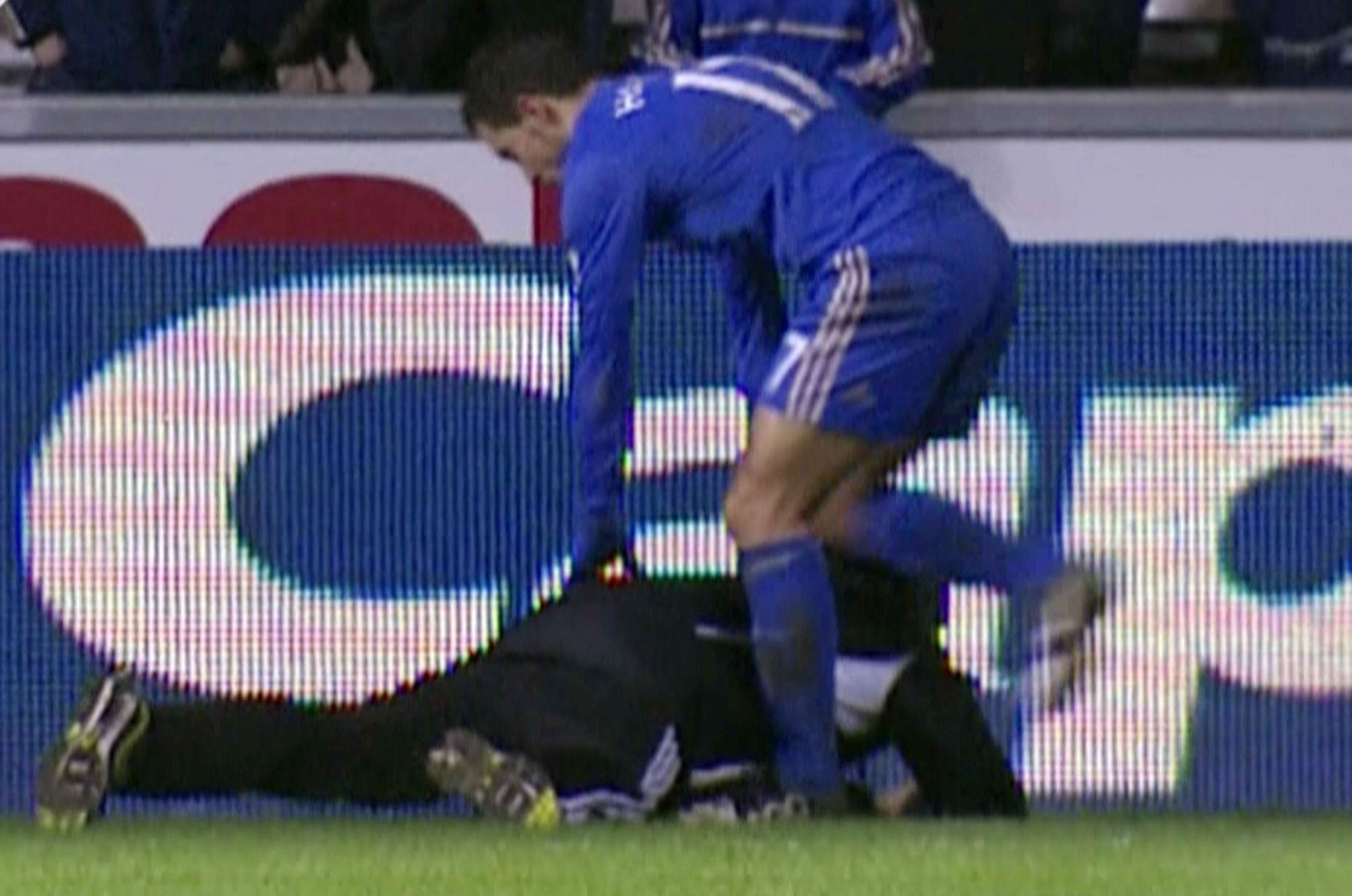 23.01.13Chelsea midfielder Eden Hazard kicks a ball boy during the Capital One