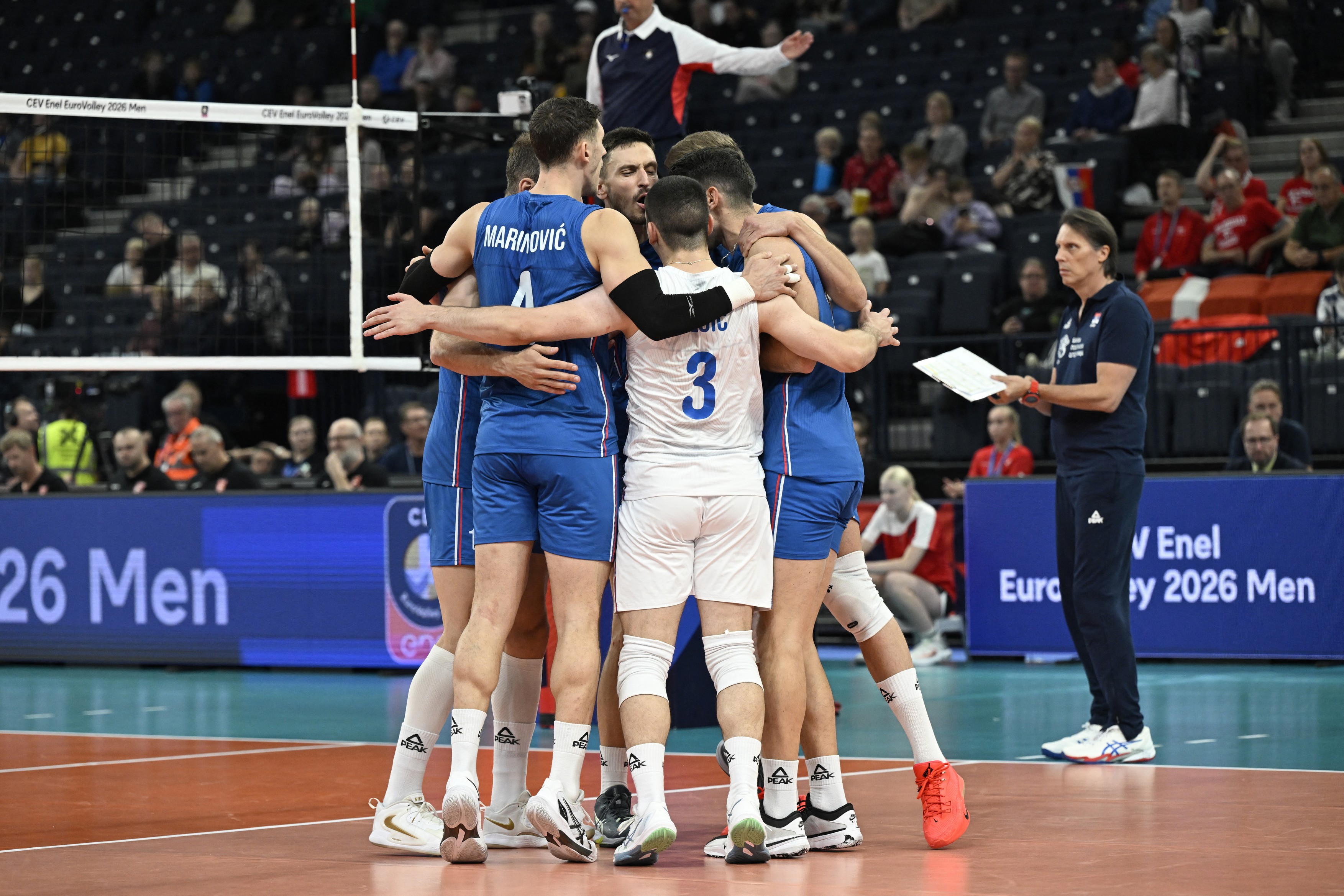 Serbia's players celebrate during the men's EuroVolley 2026 Pool C match Denmark vs Serbia in Tampere