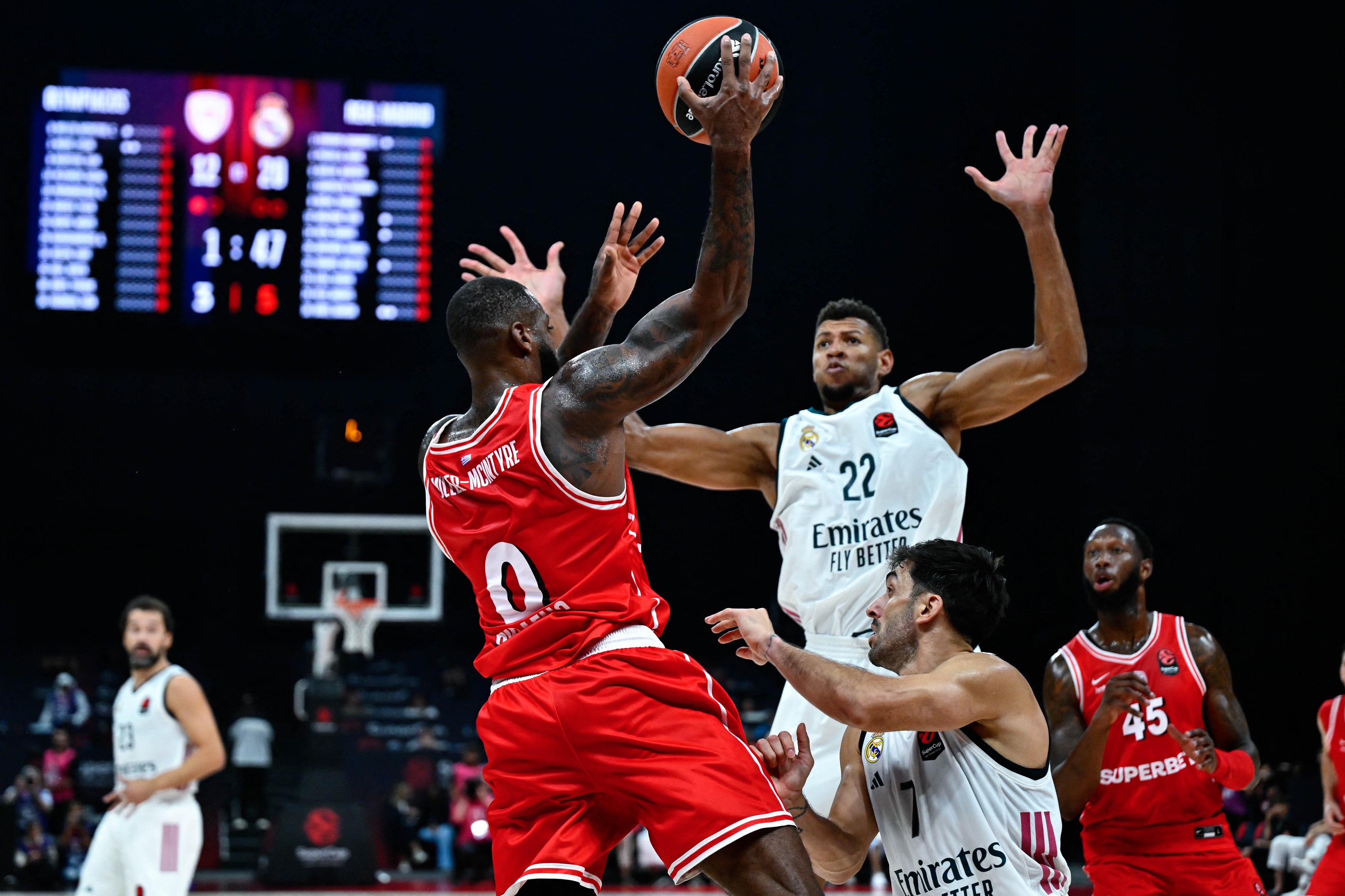 Codi Miller-McIntyre (L) of Olympiacos in action against Walter Tavares (22) of Real Madrid