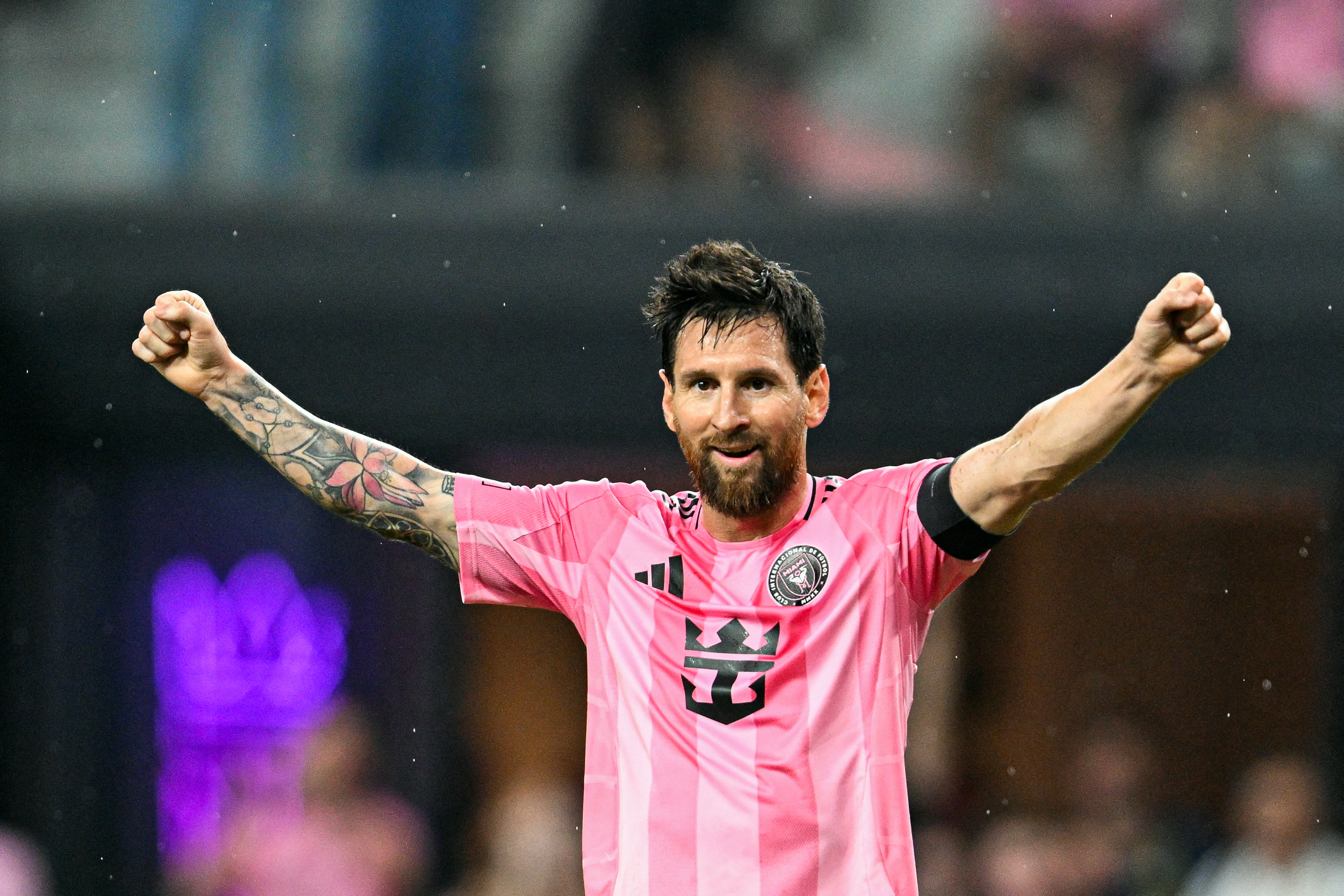 Inter Miami's Argentine forward #10 Lionel Messi celebrates a goal scored by teammate Uruguayan forward #09 Luis Suarez during the Major League Soccer (MLS)