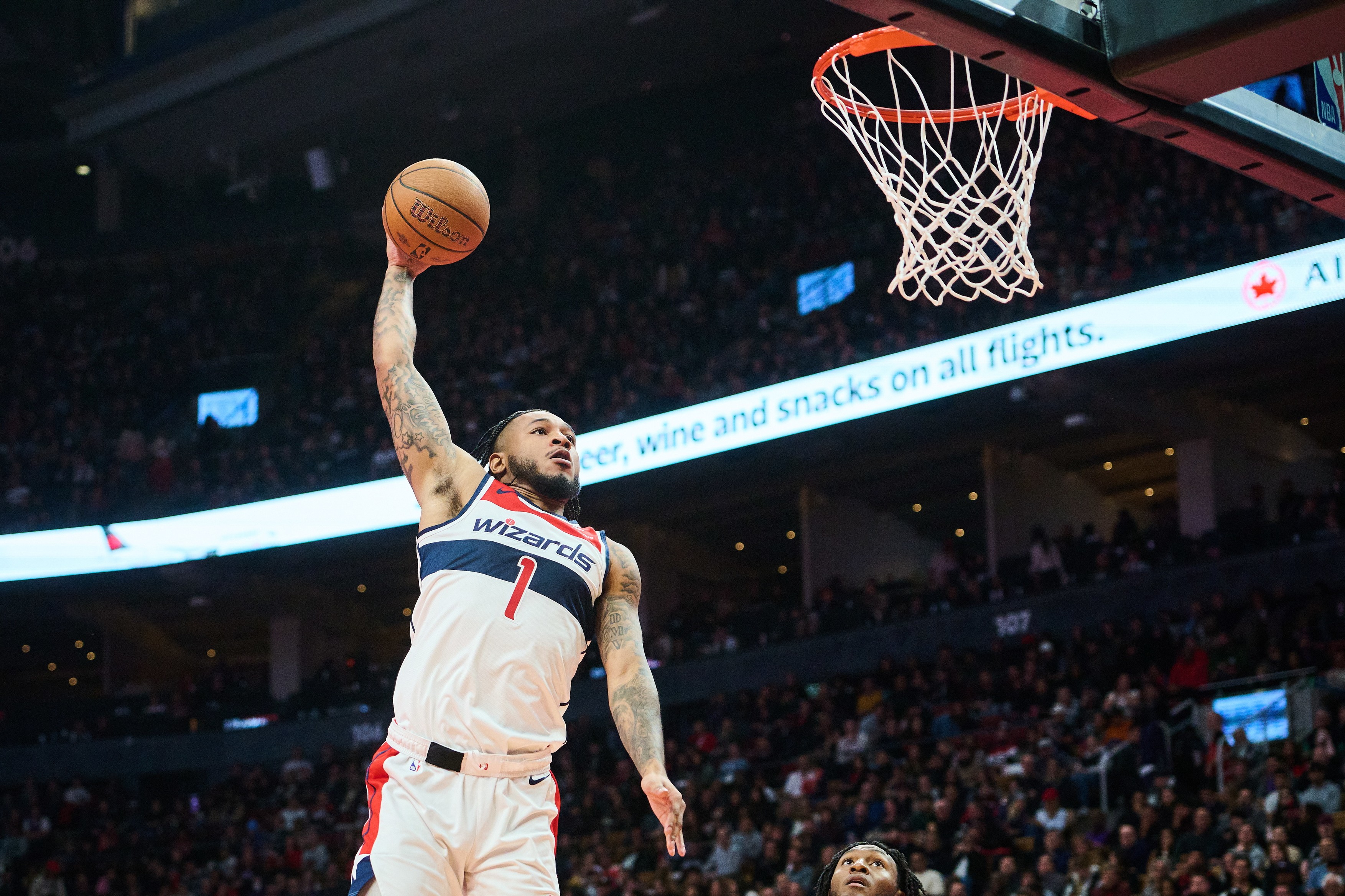 Washington Wizards' Cam Whitmore (1) dunks