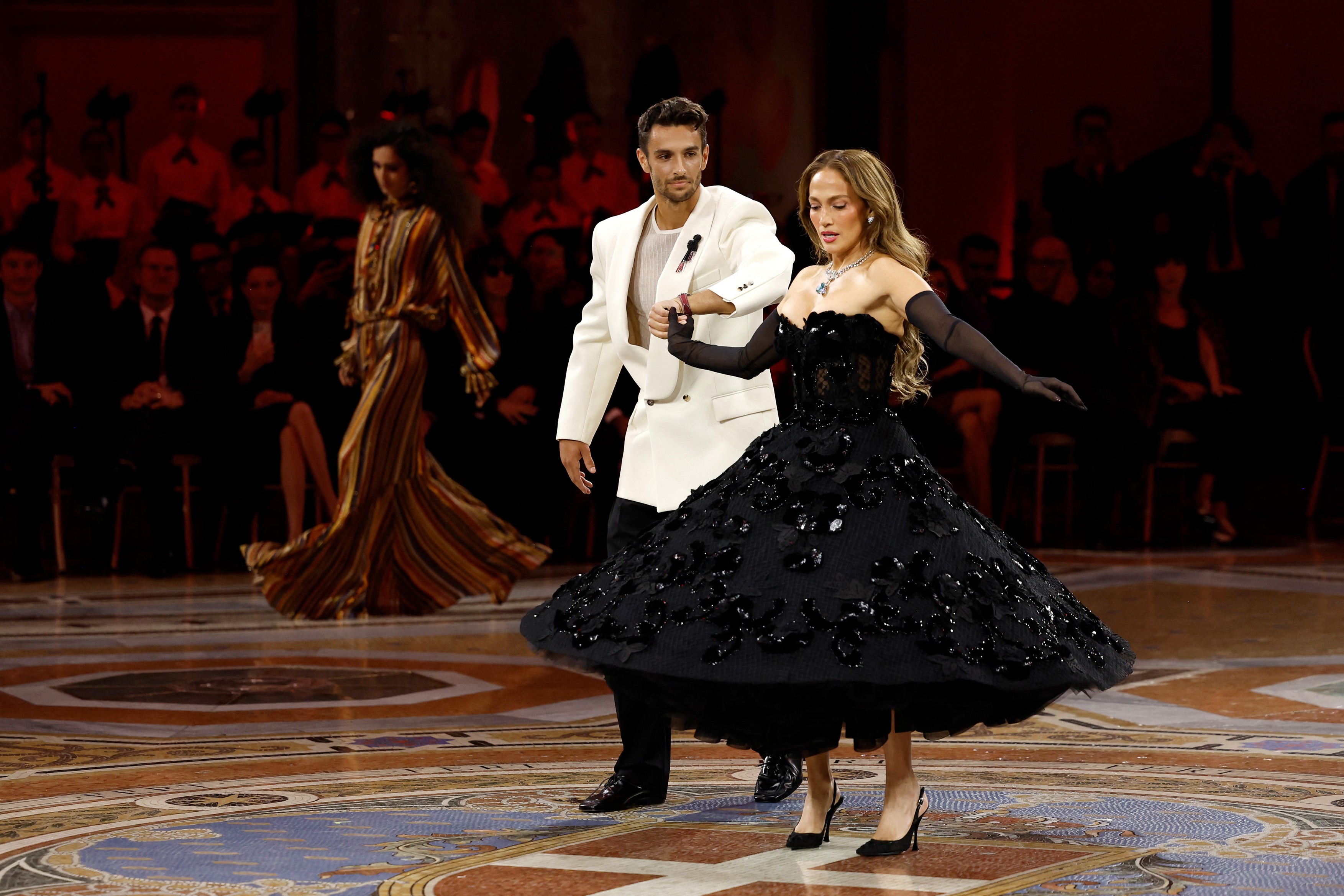 Lorenzo Musetti and Jennifer Lopez walk the runway during Vogue World: Milano 2026 at Galleria Vittorio Emanuele II