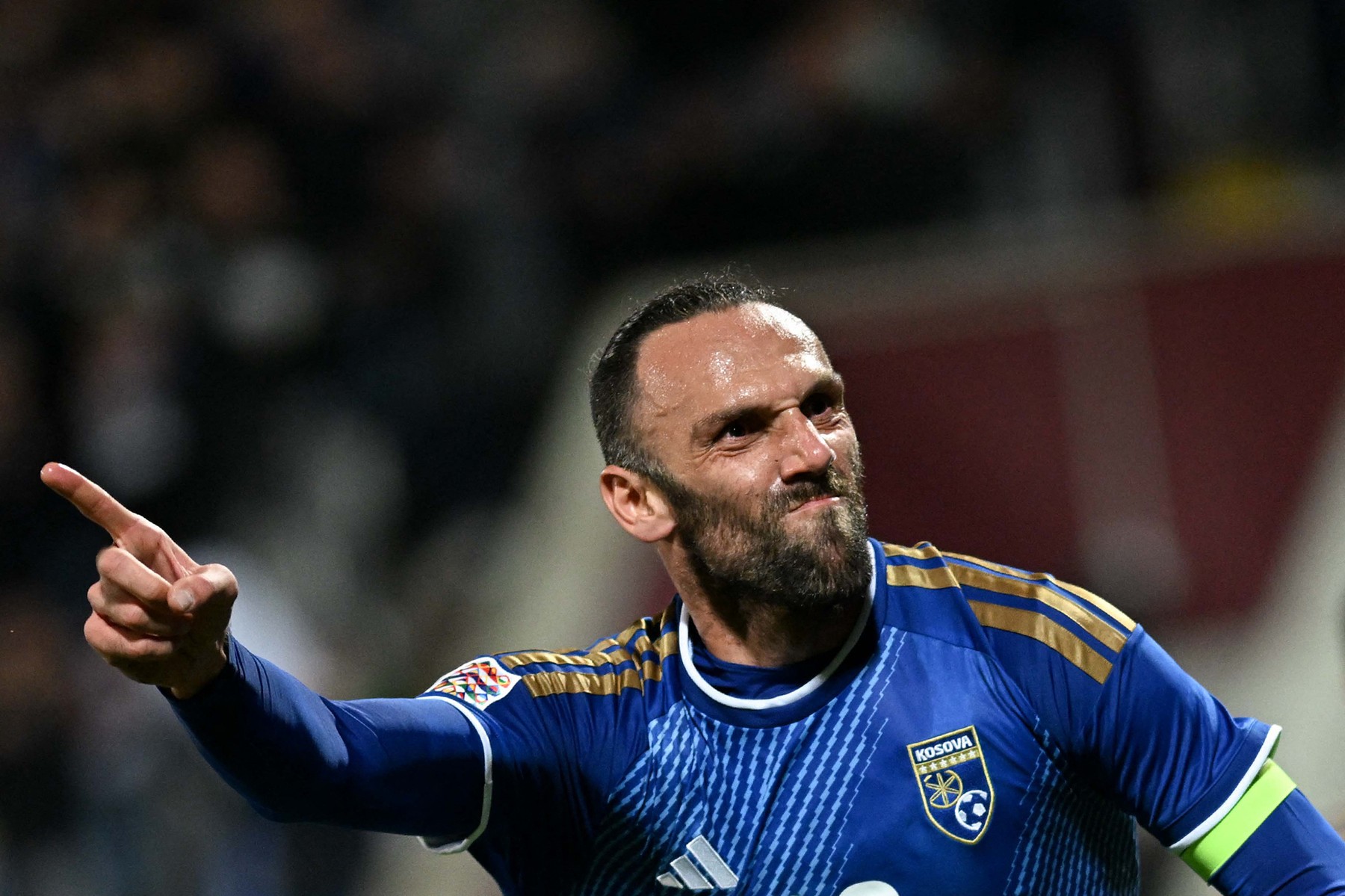 Kosovo's forward #18 Vedat Muriqi celebrates scoring his team's first goal dur