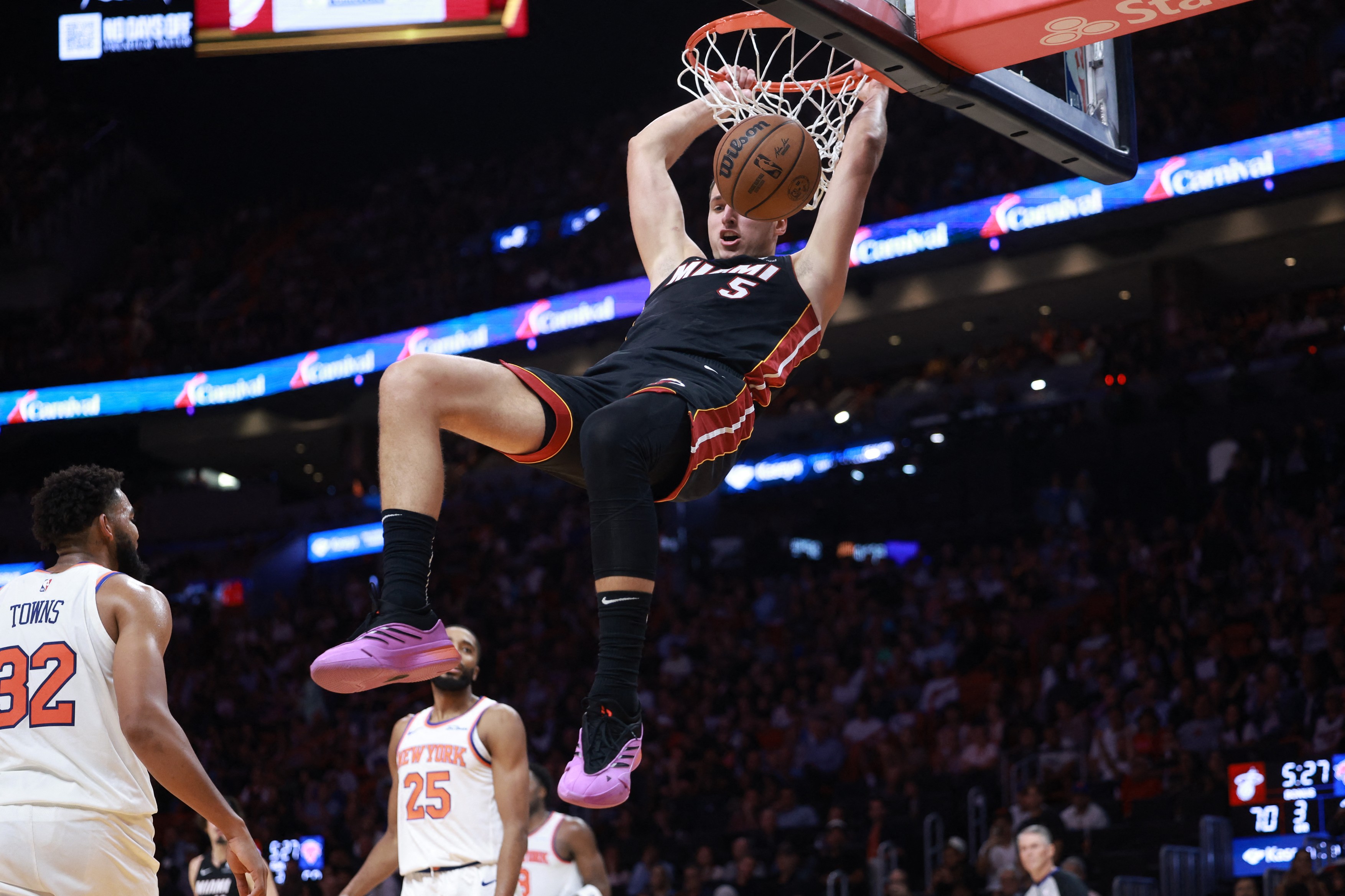 MIAMI, FLORIDA - OCTOBER 30: Nikola Jovic #5 of the Miami Heat dunks the ball