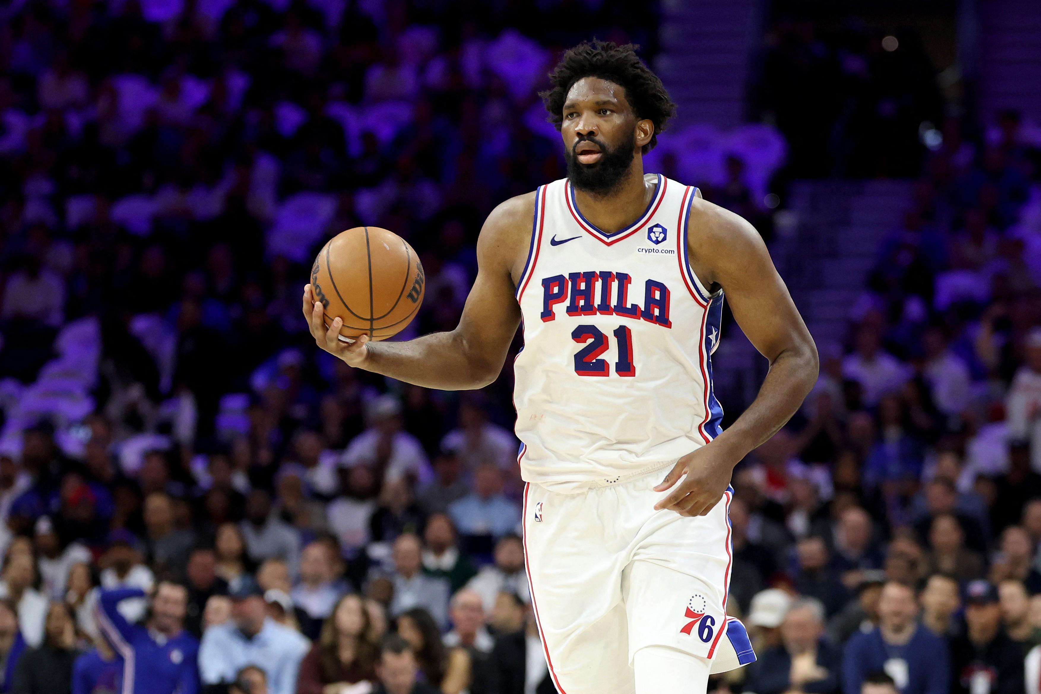 Joel Embiid #21 of the Philadelphia 76ers dribbles the ball