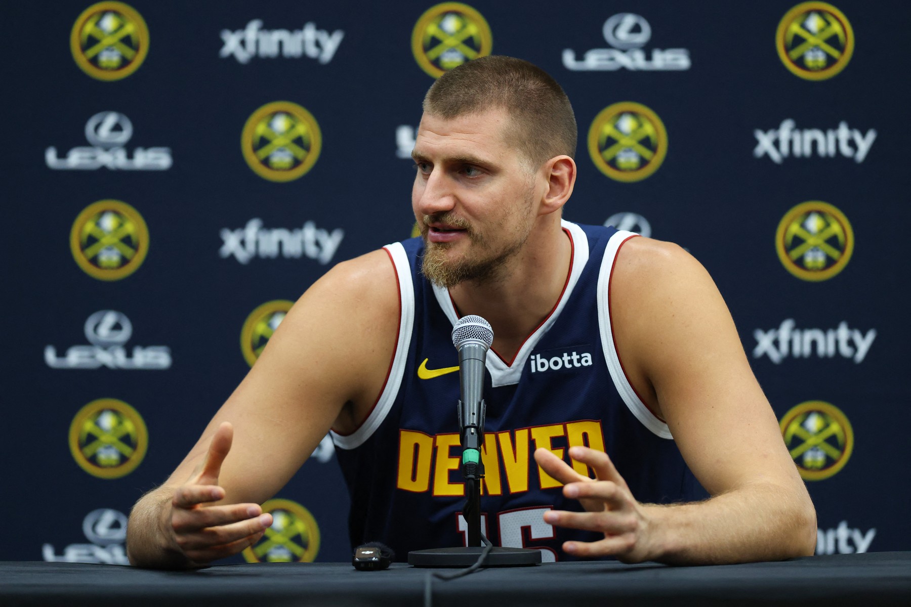 DENVER, CO - SEPTEMBER 28: Nikola Jokic #15 of the Denver Nuggets fi