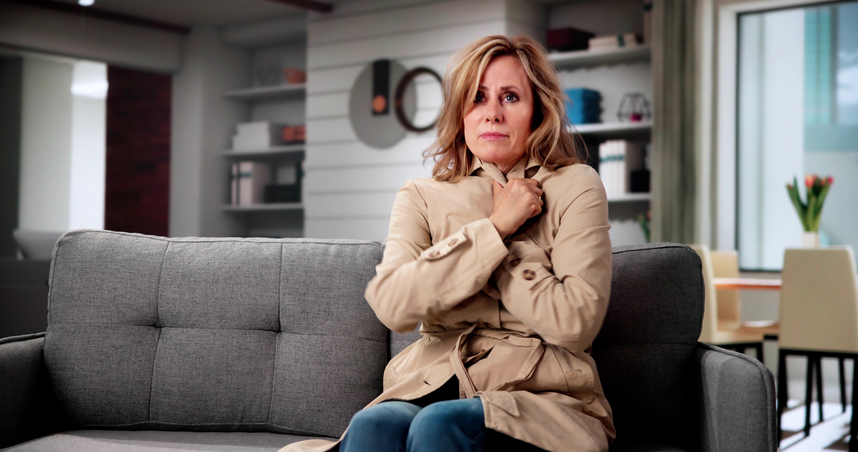 Young Woman With Warm Clothing Feeling The Cold Inside House