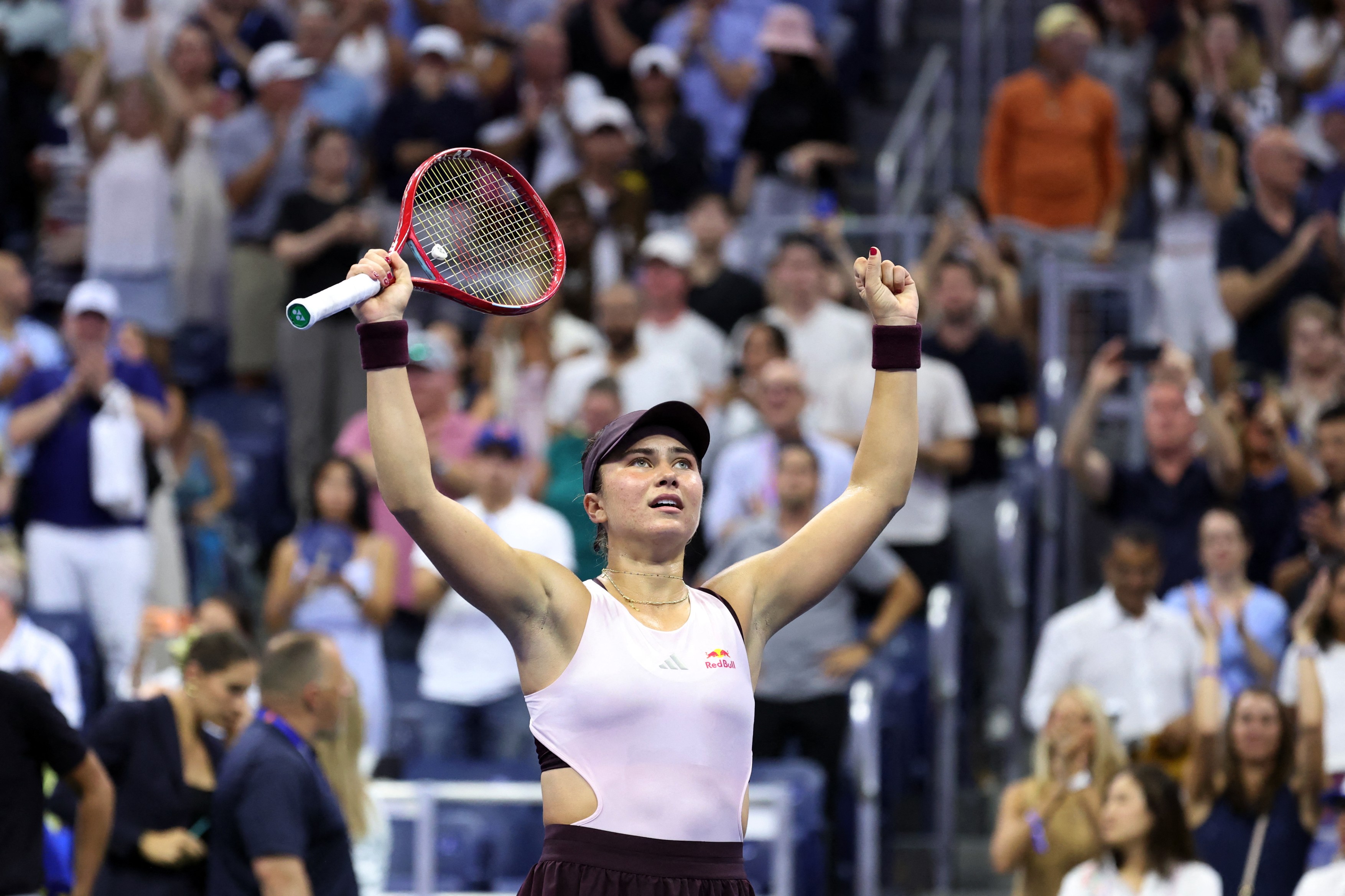 USA's Iva Jovic celebrates after defeating Philippines' Alexandra Eala